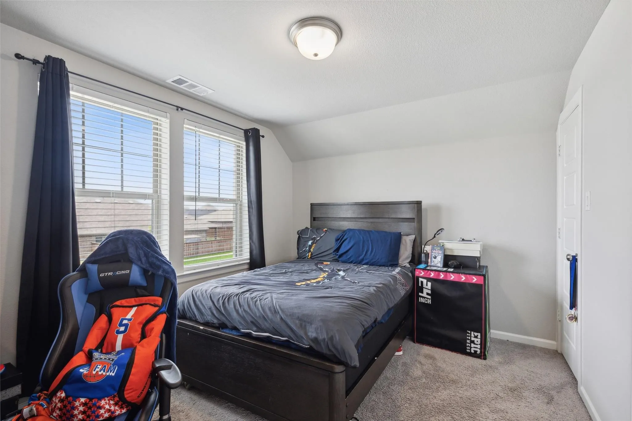 2nd Floor Bedroom 4 featuring a sloped ceiling, light gray carpeting, and white walls