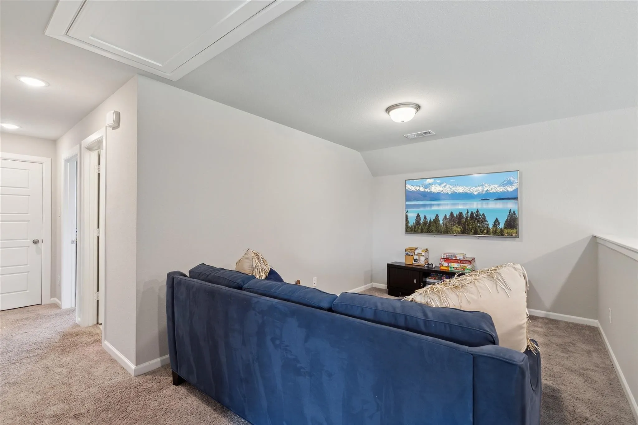 2nd Floor Living Area - Carpeted room featuring a sloped ceiling, recessed lighting, and a flush mount ceiling fixture