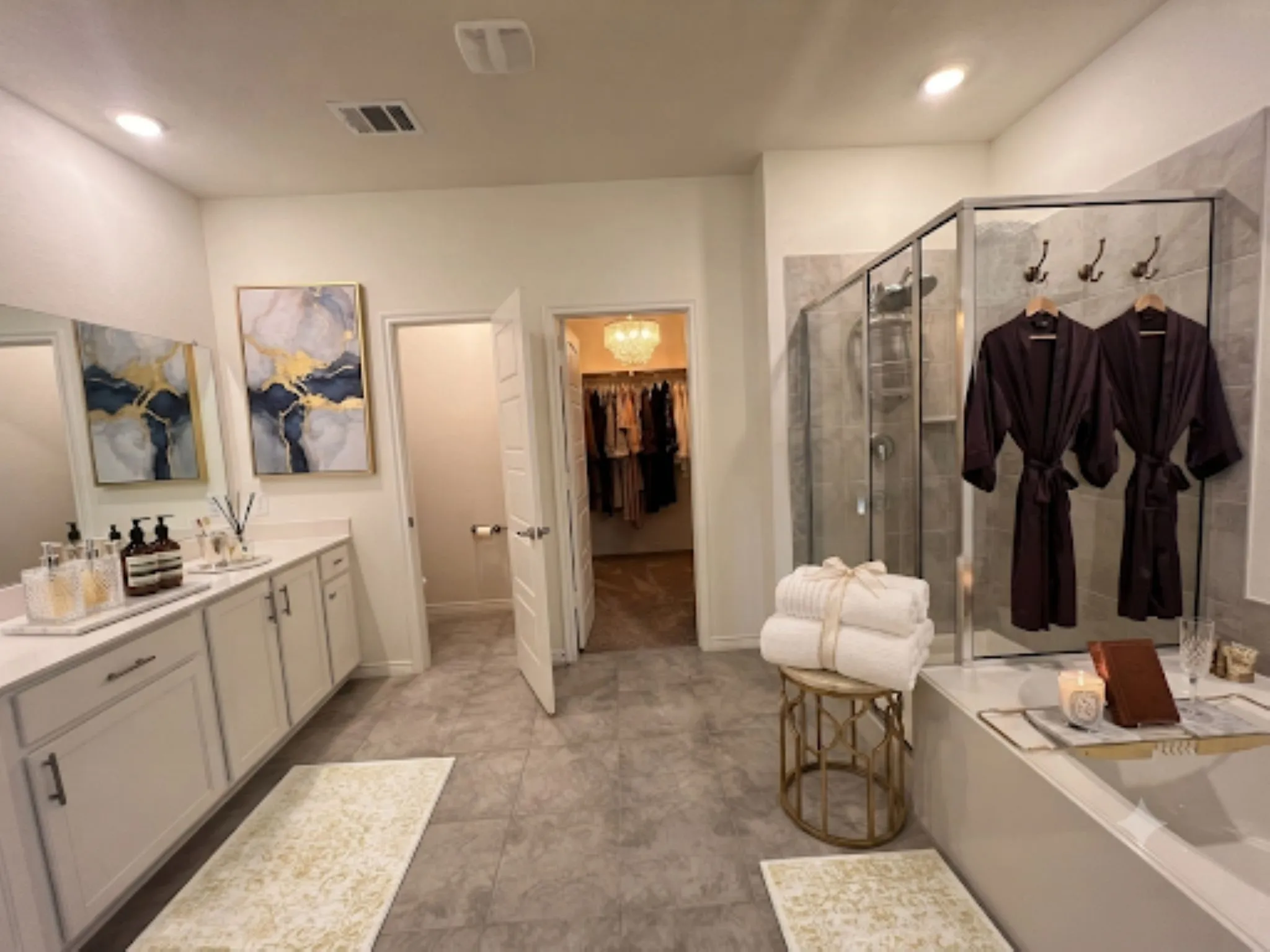 Virtually staged master bathroom and walk-in closet, garden tub and separate shower.