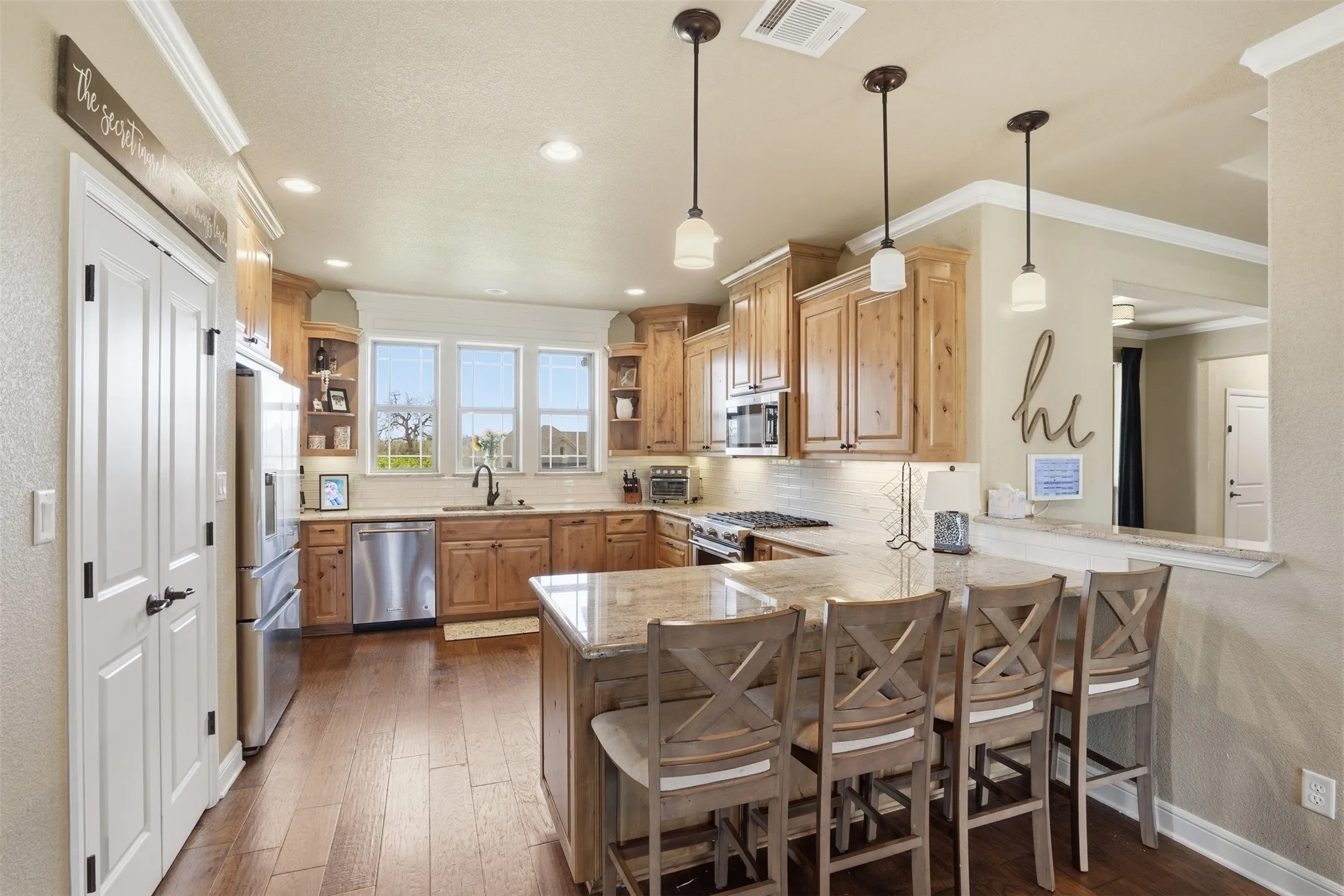 Open and inviting kitchen with wonderful breakfast bar.
