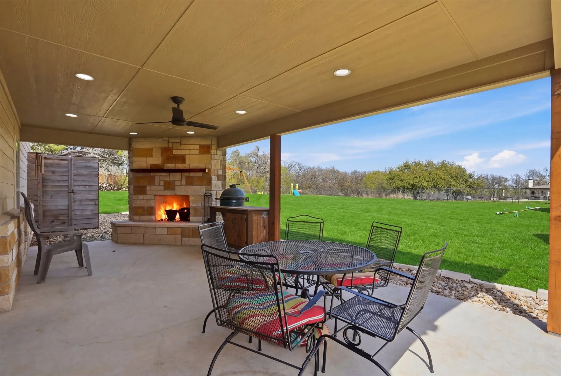 Fireplace, seating area and even an outdoor shower.