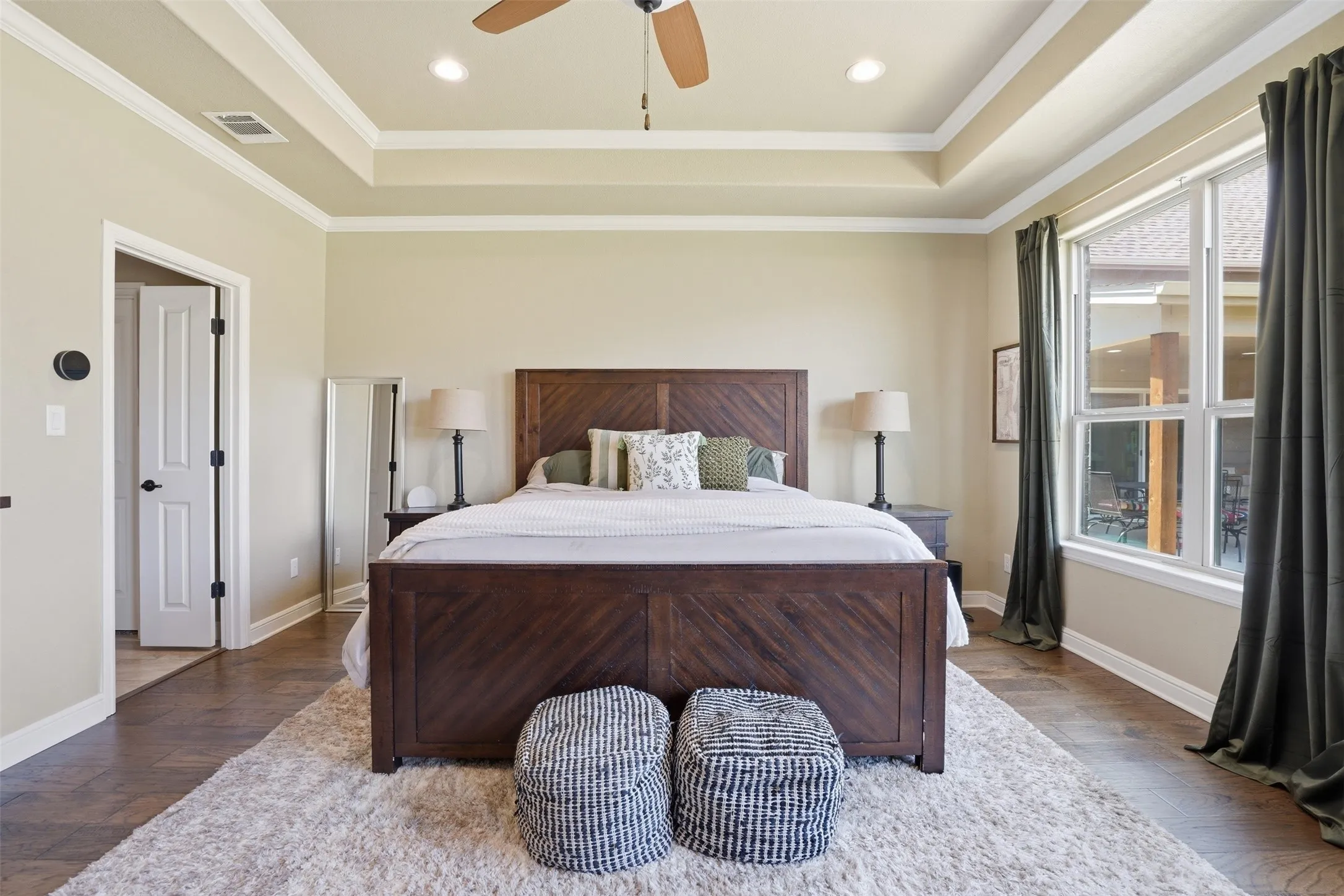 primary bedroom has great natural light and wonderful view of backyard.