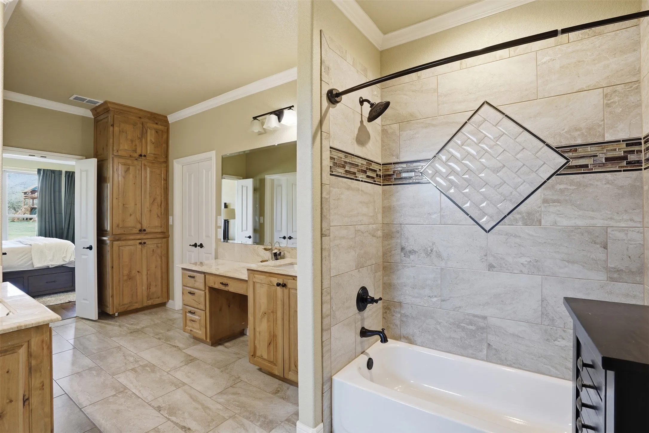 Primary bath conveniently connects to laundry.