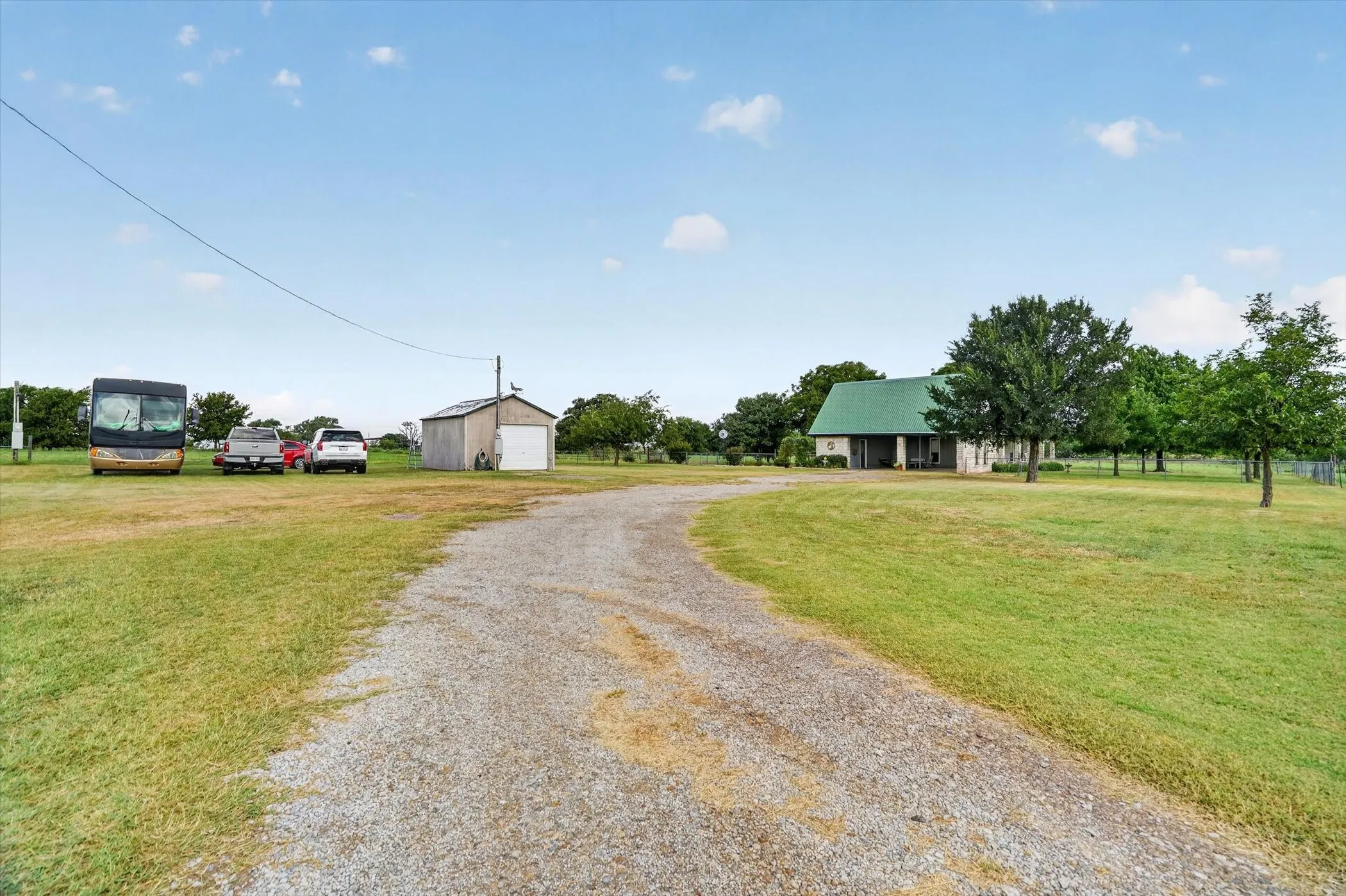 Gravel drive leading to residence