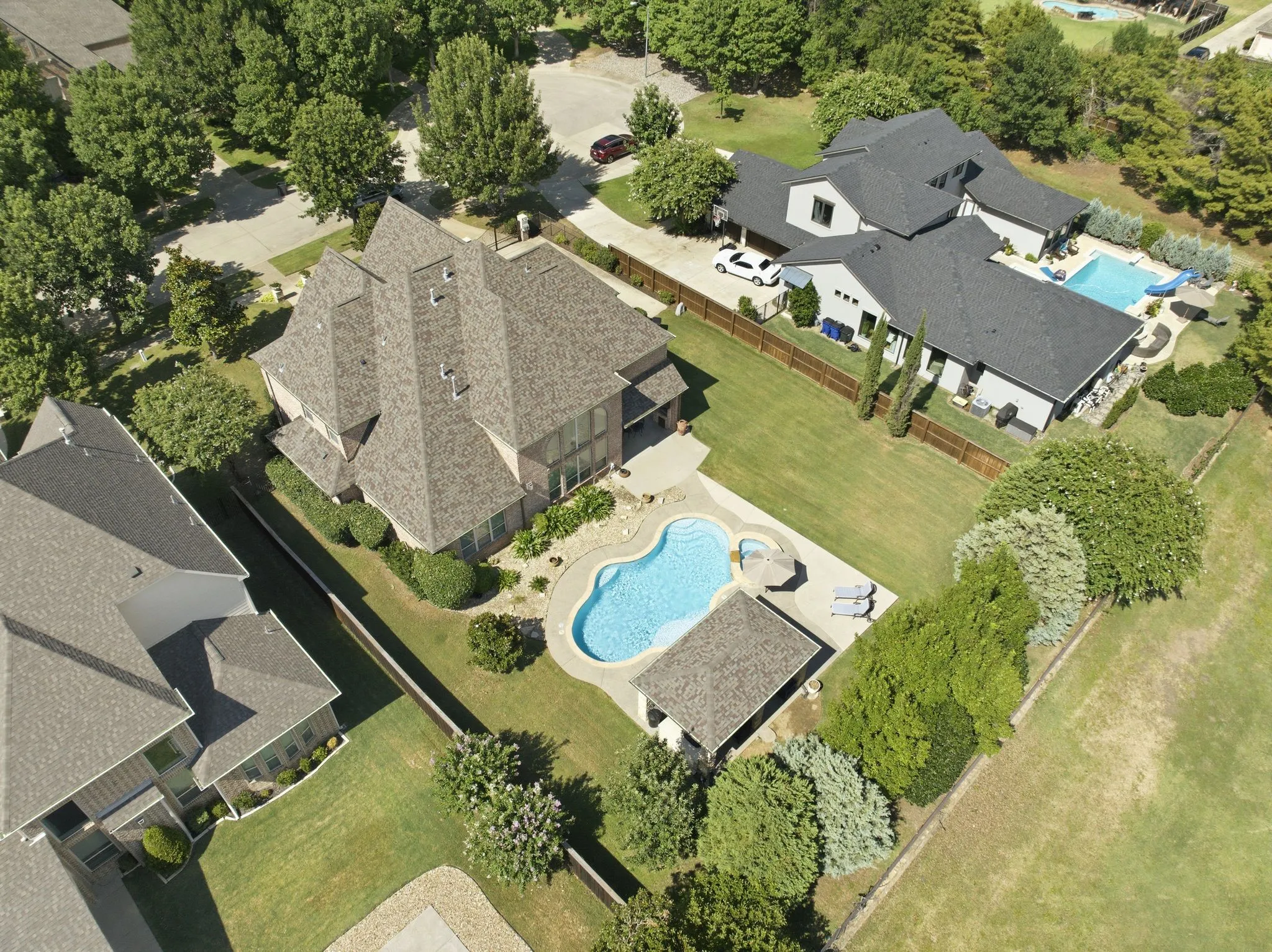 Along the back of the property you will find plenty of trees and greenbelt for additional privacy.