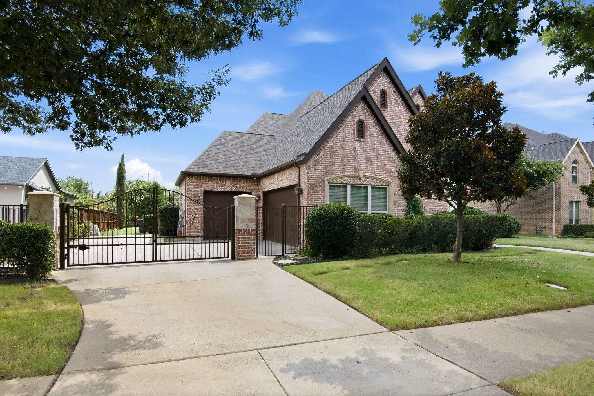 Three car garage with iron gate and room for extra parking. 2 outlets in the garage ready for your electric vehicle.