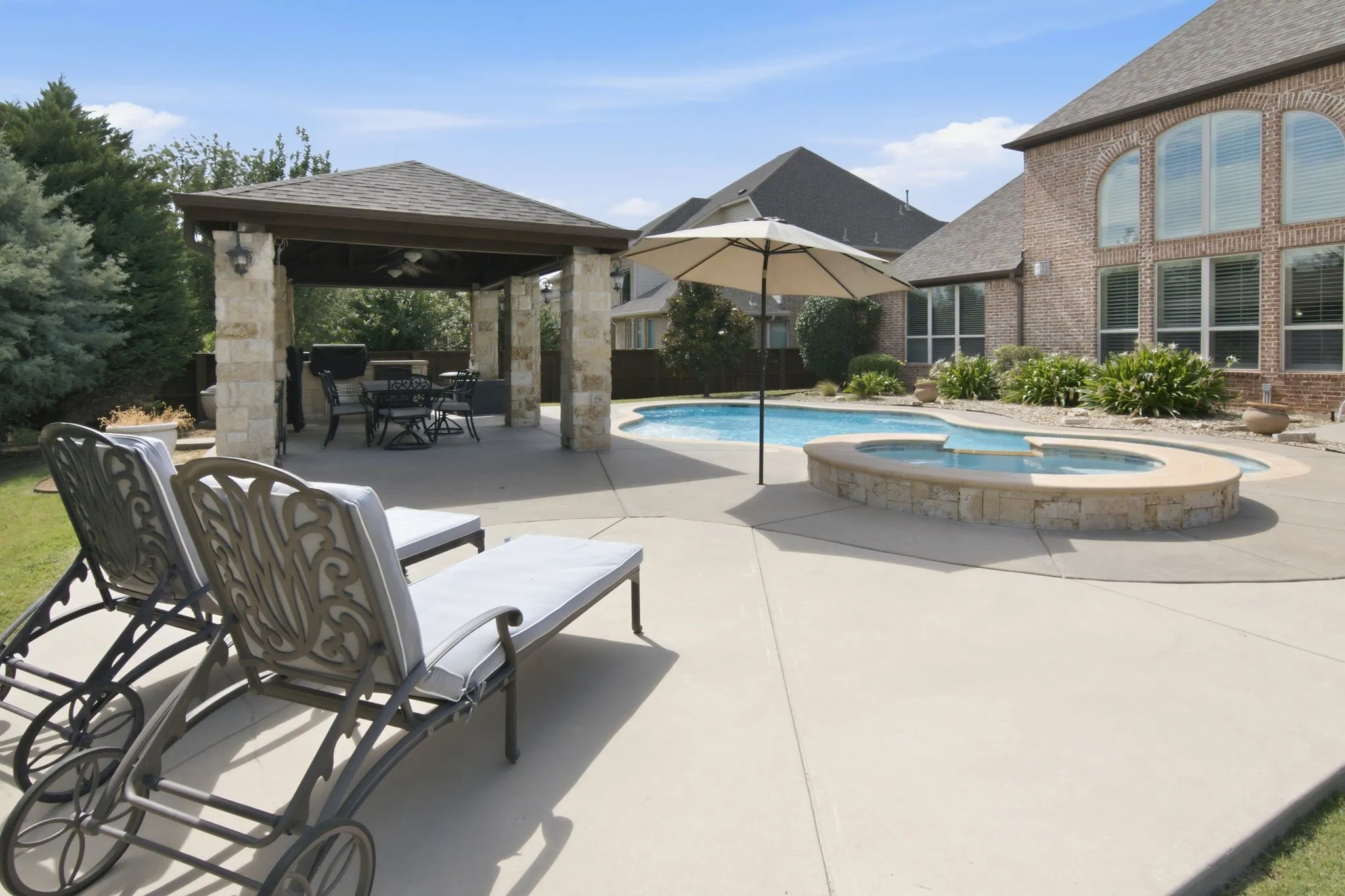 Salt water pool and spa with Pentair equipment and LED lighting.