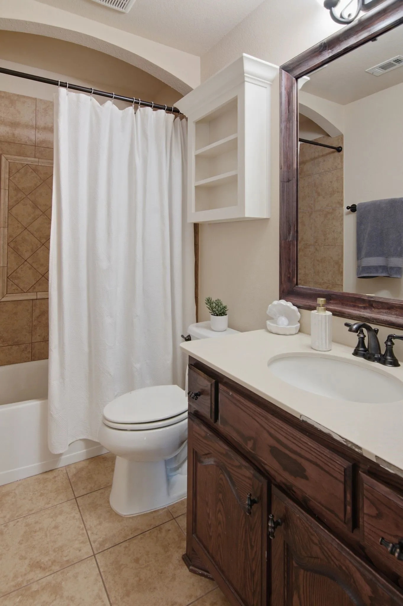 Secondary bath attached to bedroom.