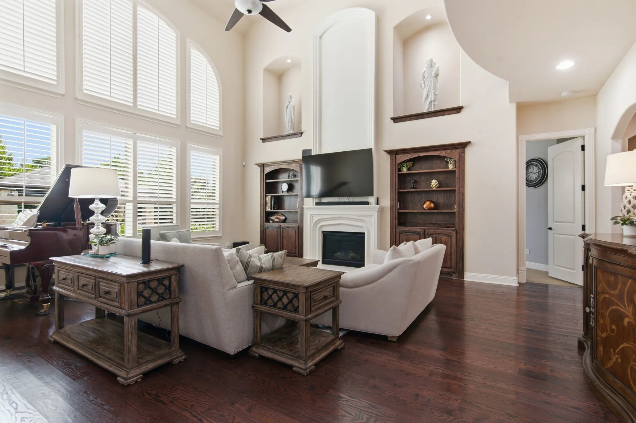 Wood floors, gas fireplace and built in bookcases.
