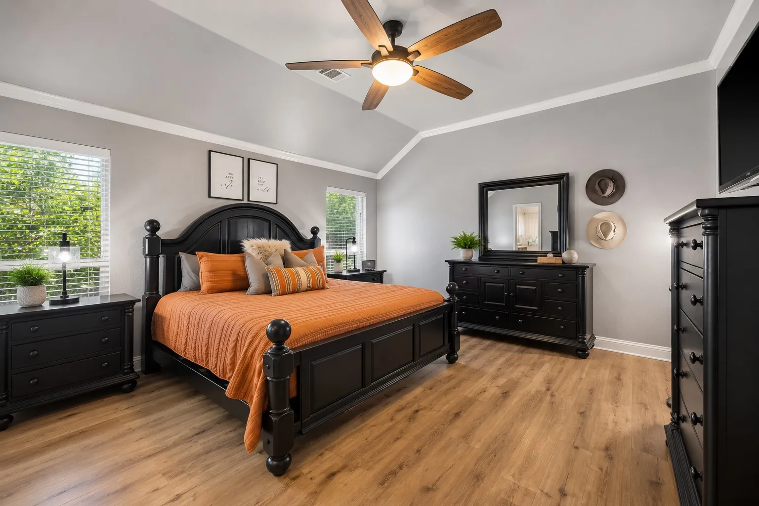 The owners suite is quite the retreat tucked away in the back of the home and offering the perfect getaway.
