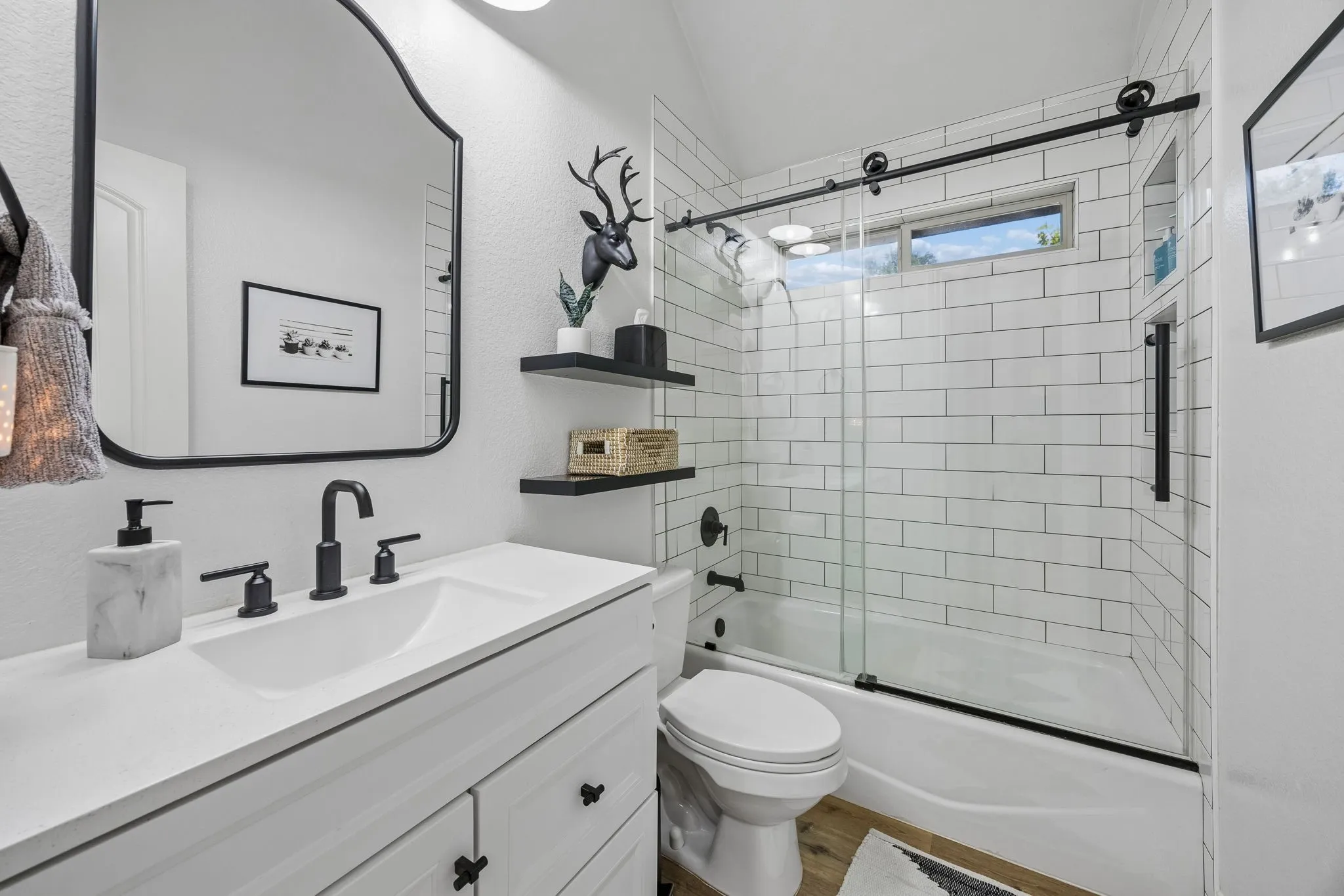 Secondary bathroom, also updated in 2022.