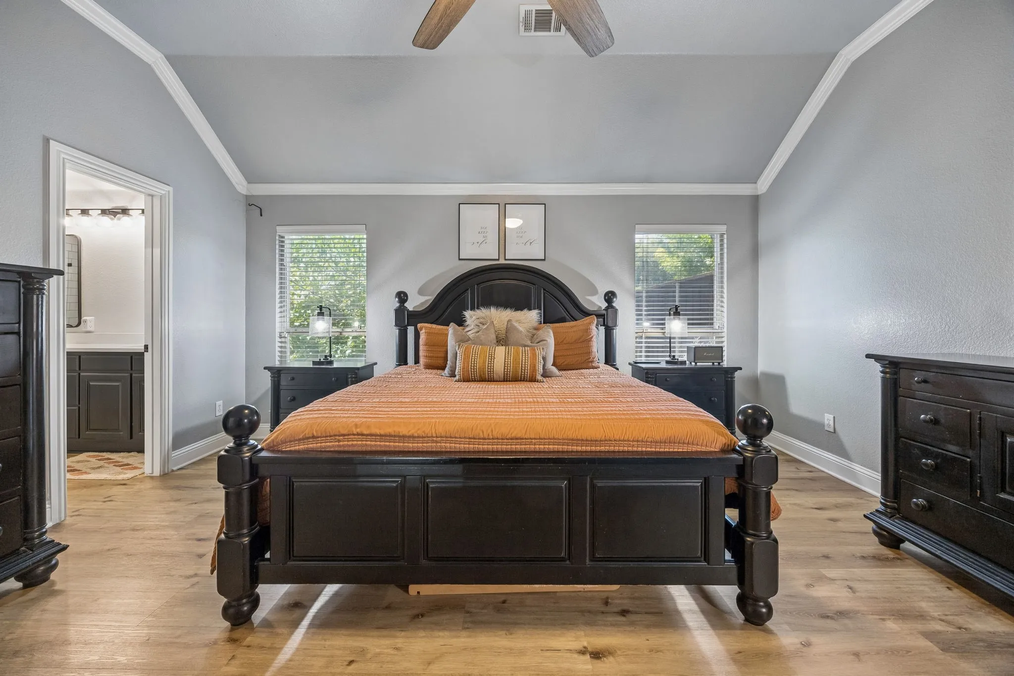 The owners suite is quite the retreat tucked away in the back of the home and offering the perfect getaway.