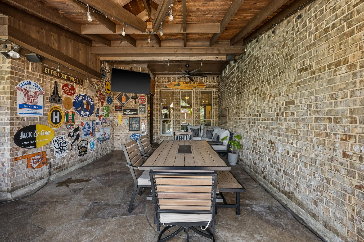 Huge covered patio ready for family dinners al fresco.