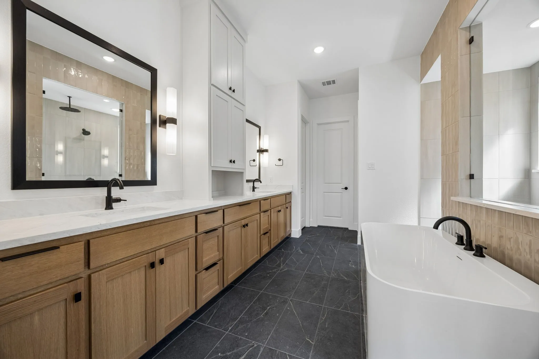 No shortage of space or style in this over the top owner's bath.