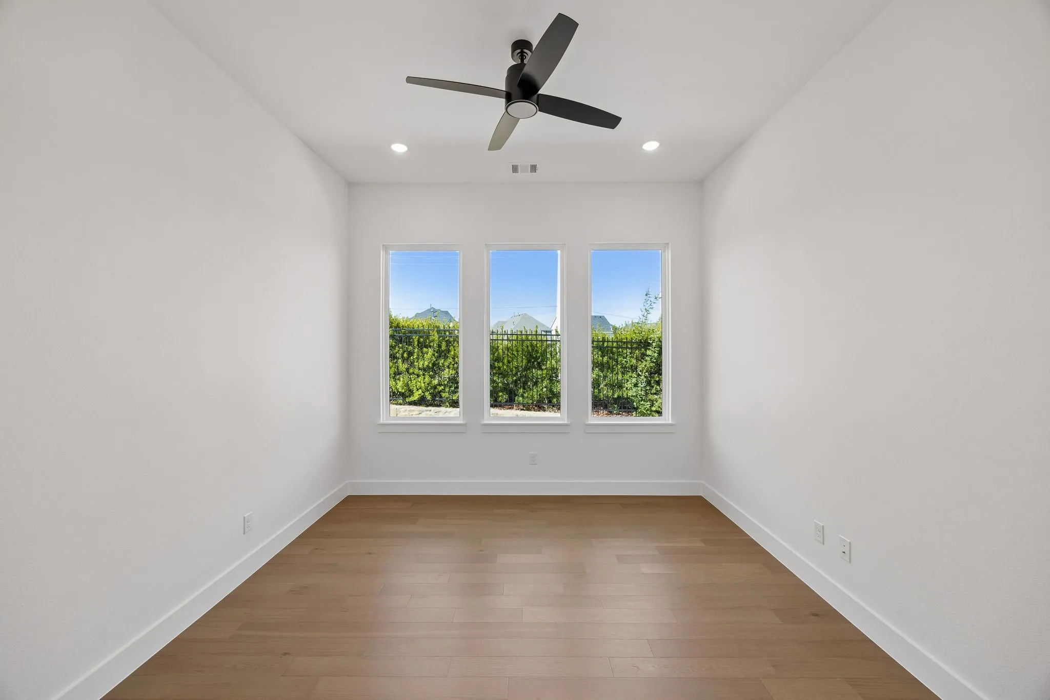 Whether it's working from home or enjoying a good book, you will appreciate this light and spacious home office.