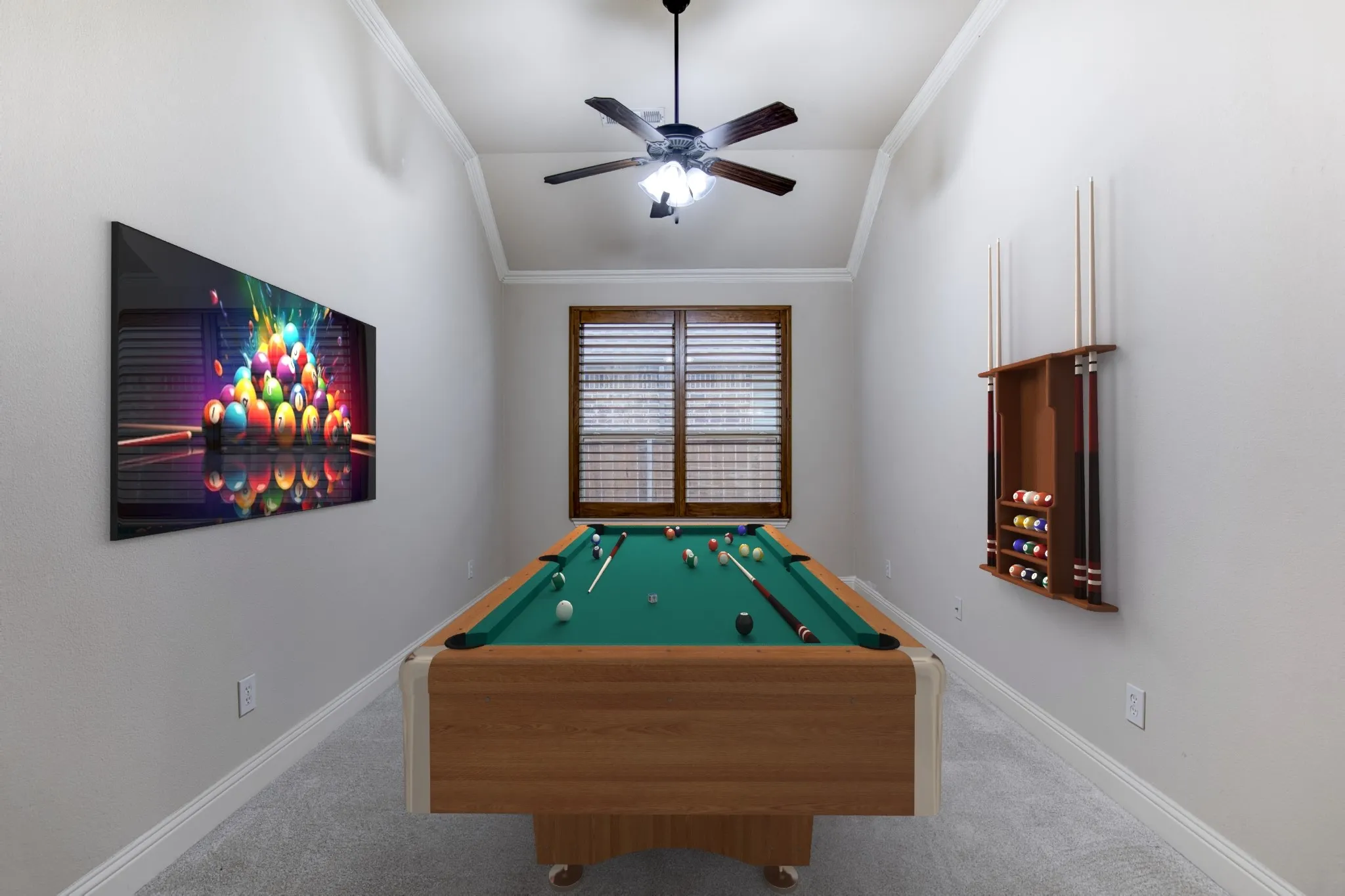 Versatile game room with vaulted ceiling.