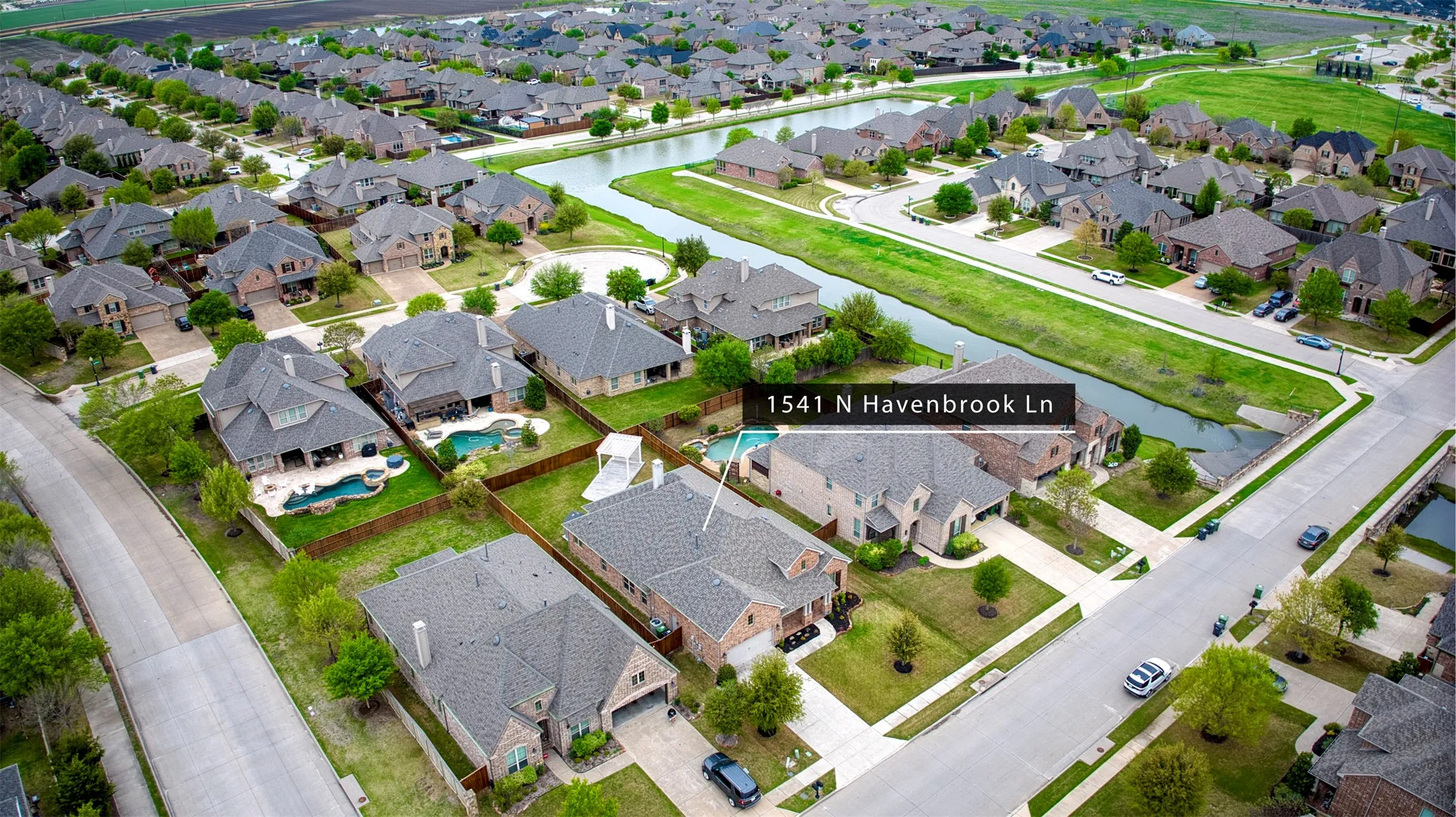 Aerial view of home in sub division.