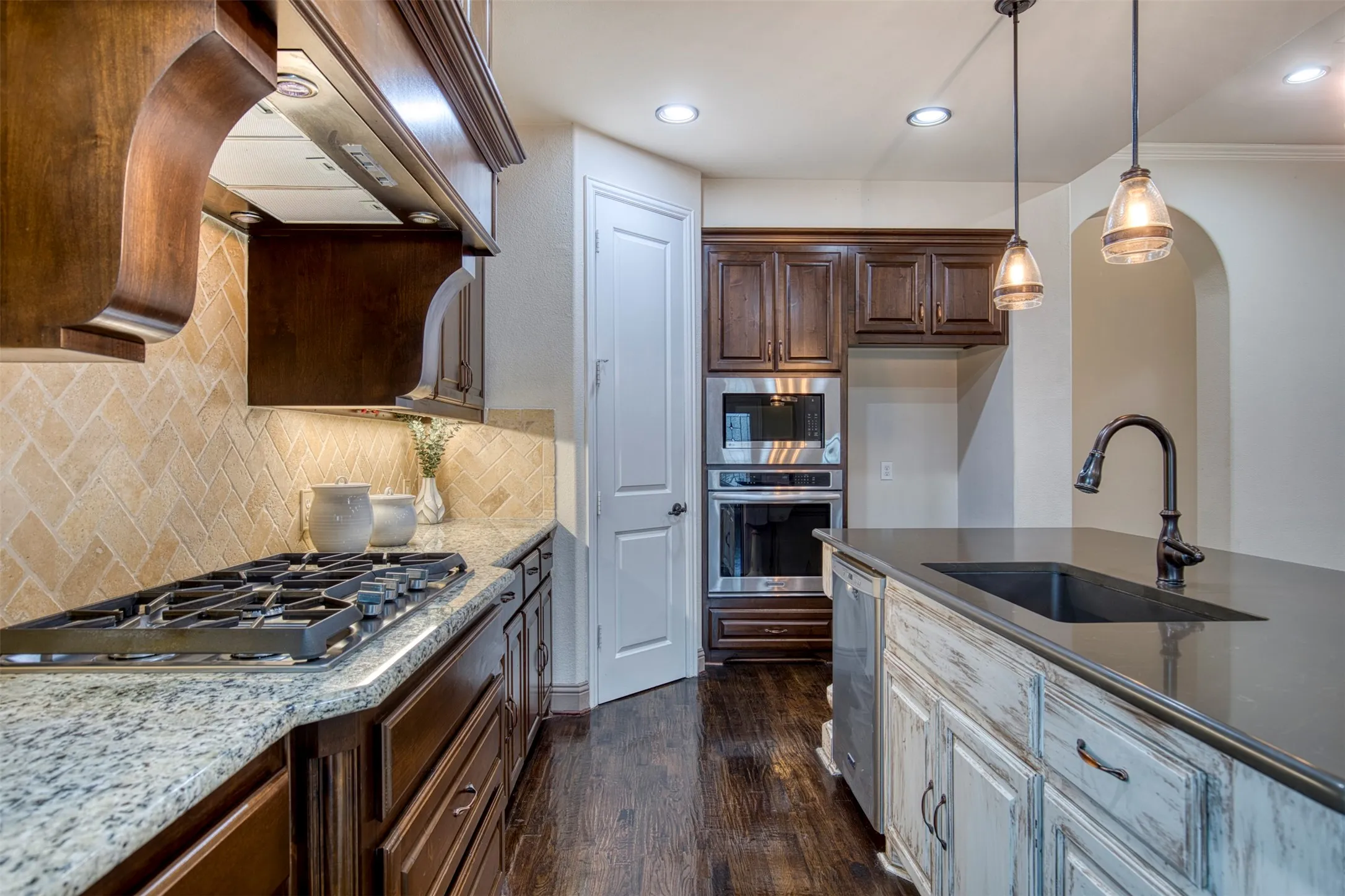 Kitchen with walk-in pantry.