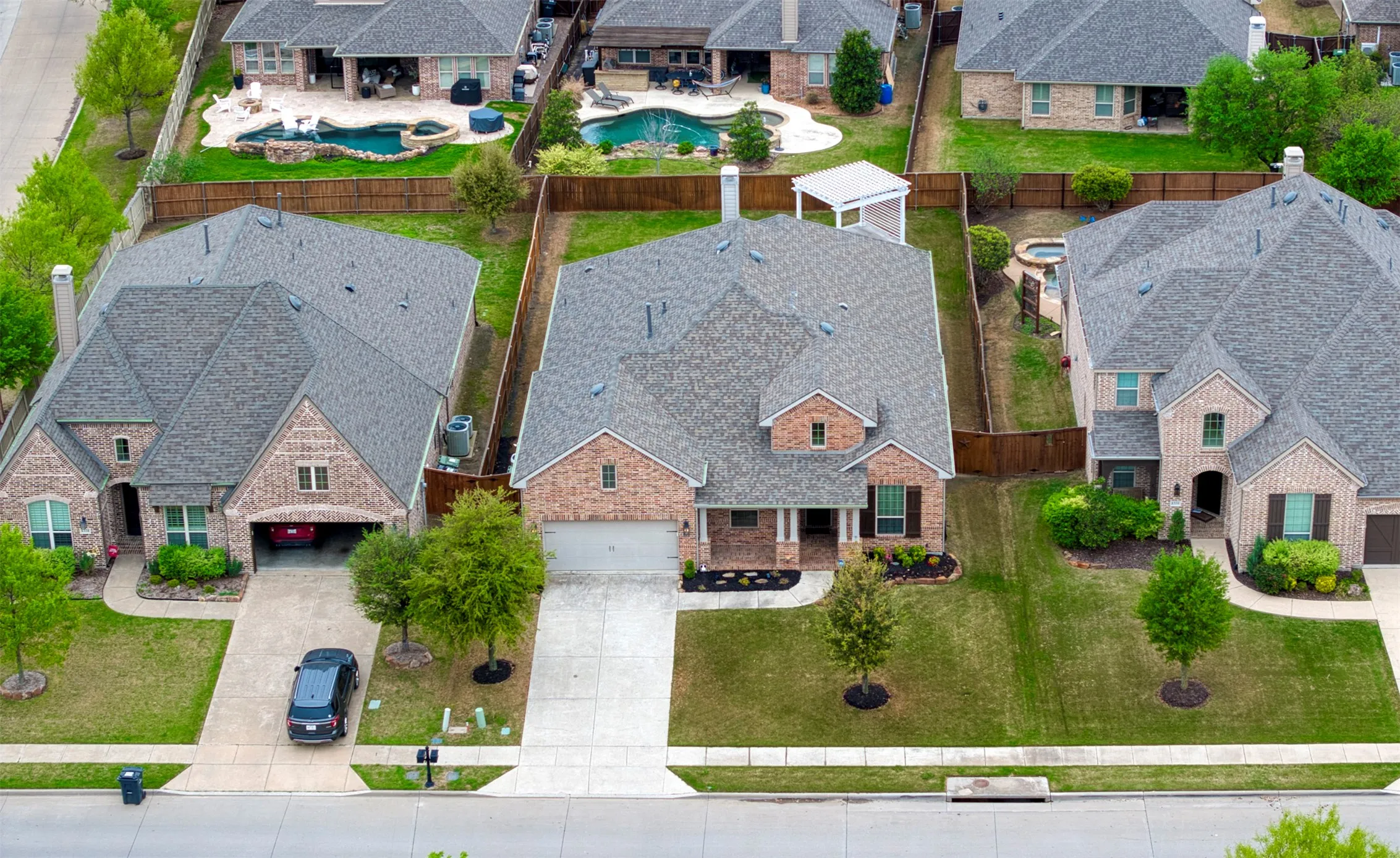 Aerial view of home showcasing lot.