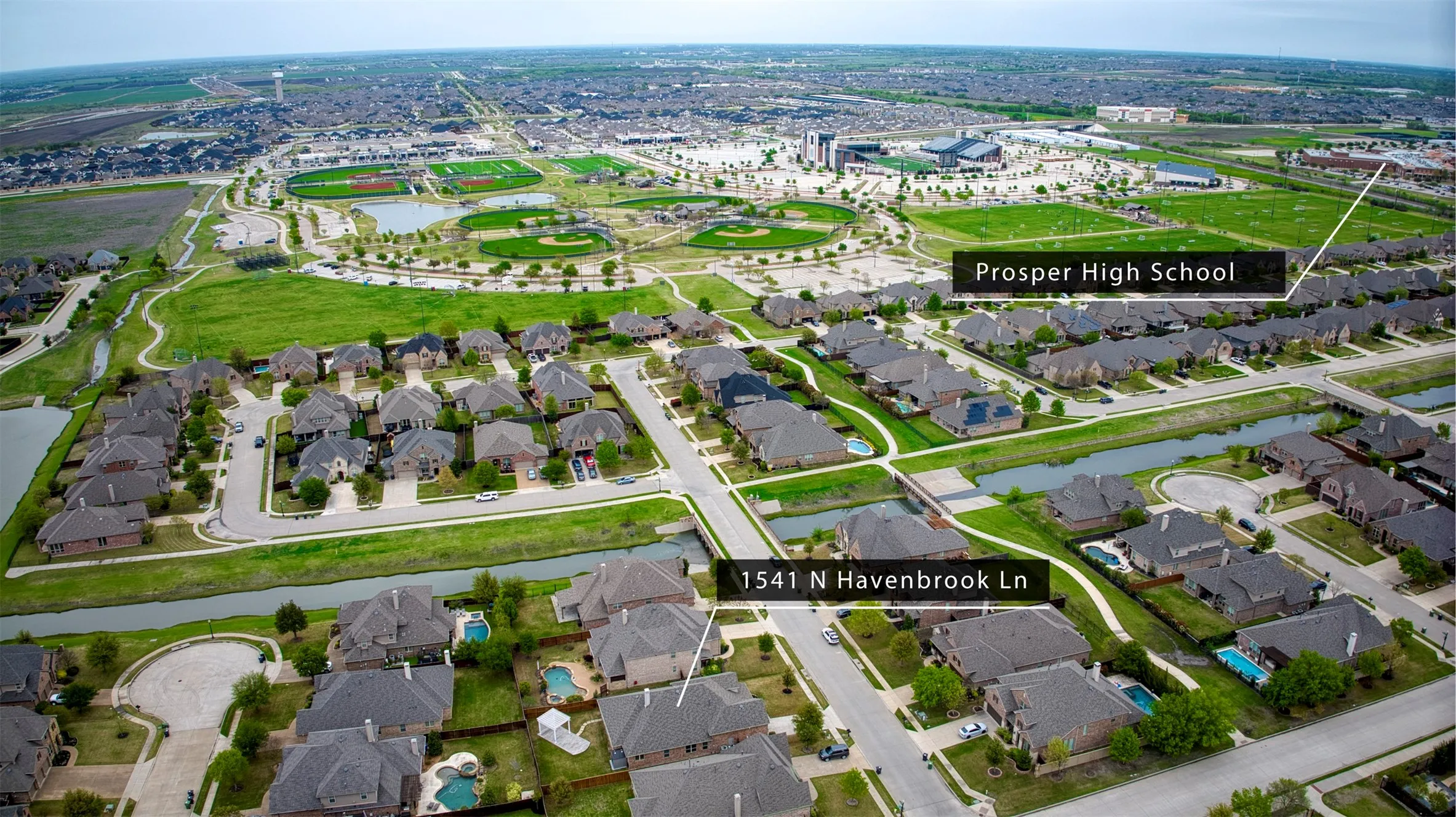 Aerial view of home and High School.
