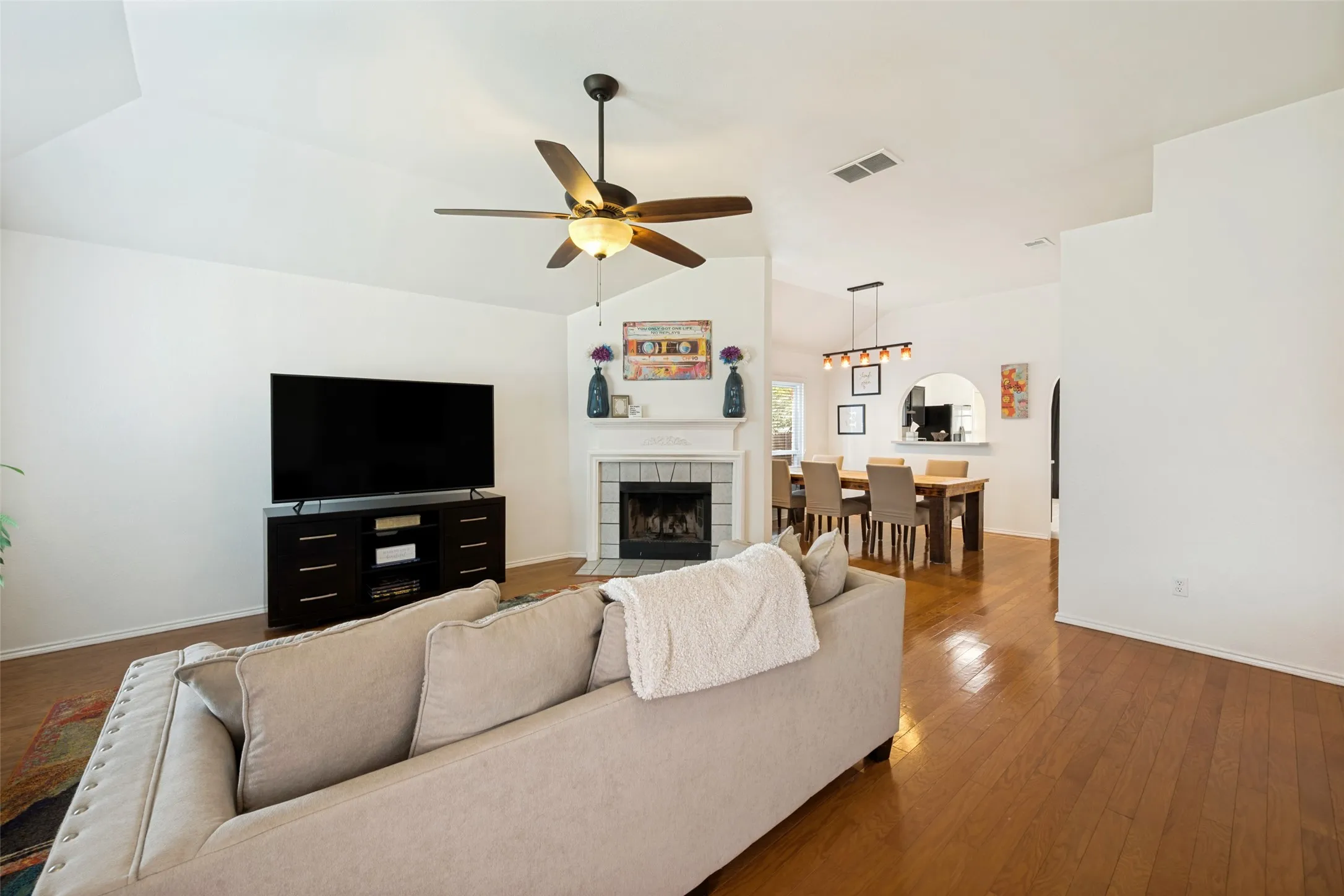 Bright living area with engineered hardwood floors