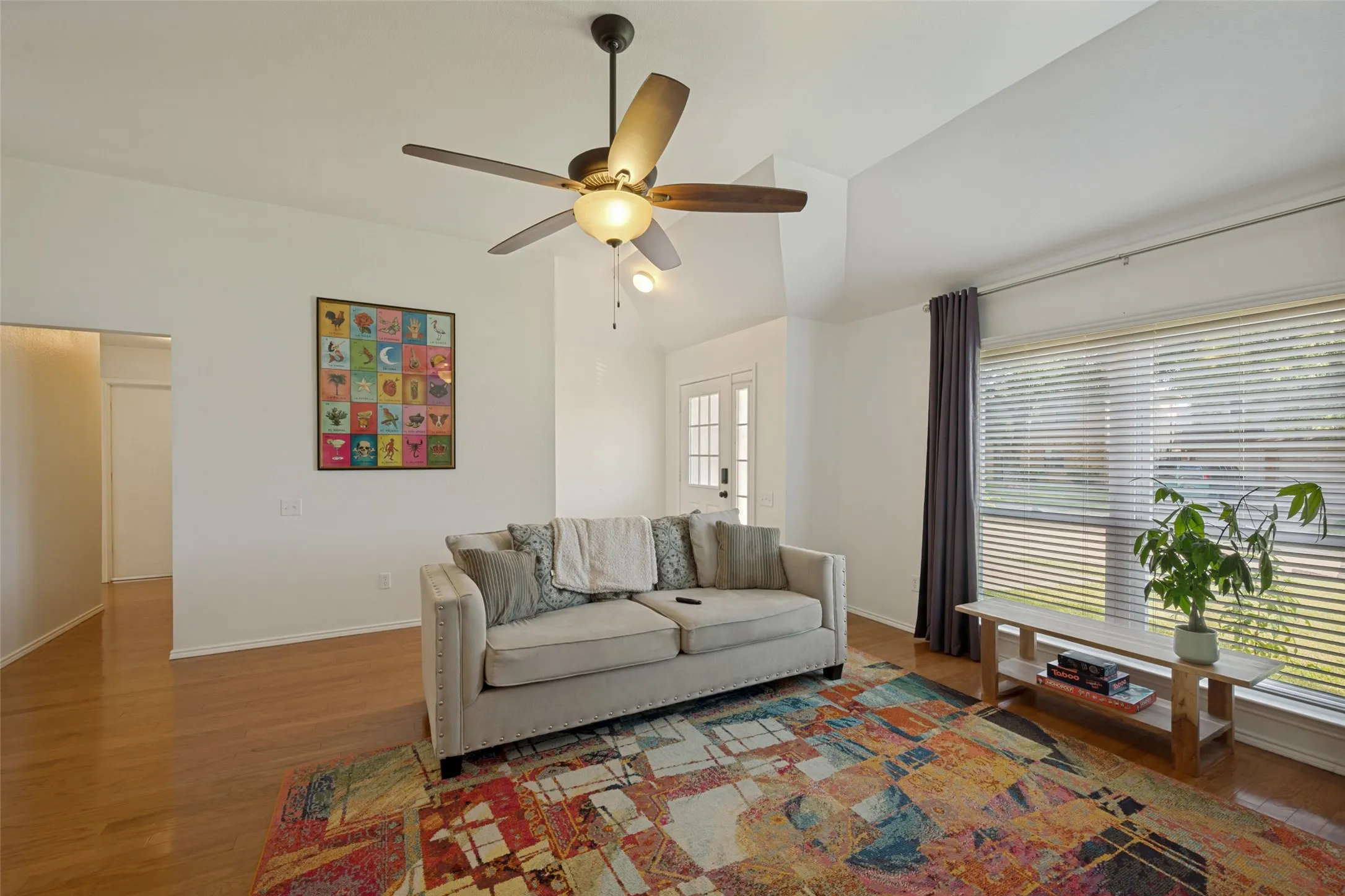Bright living area with engineered hardwood floors