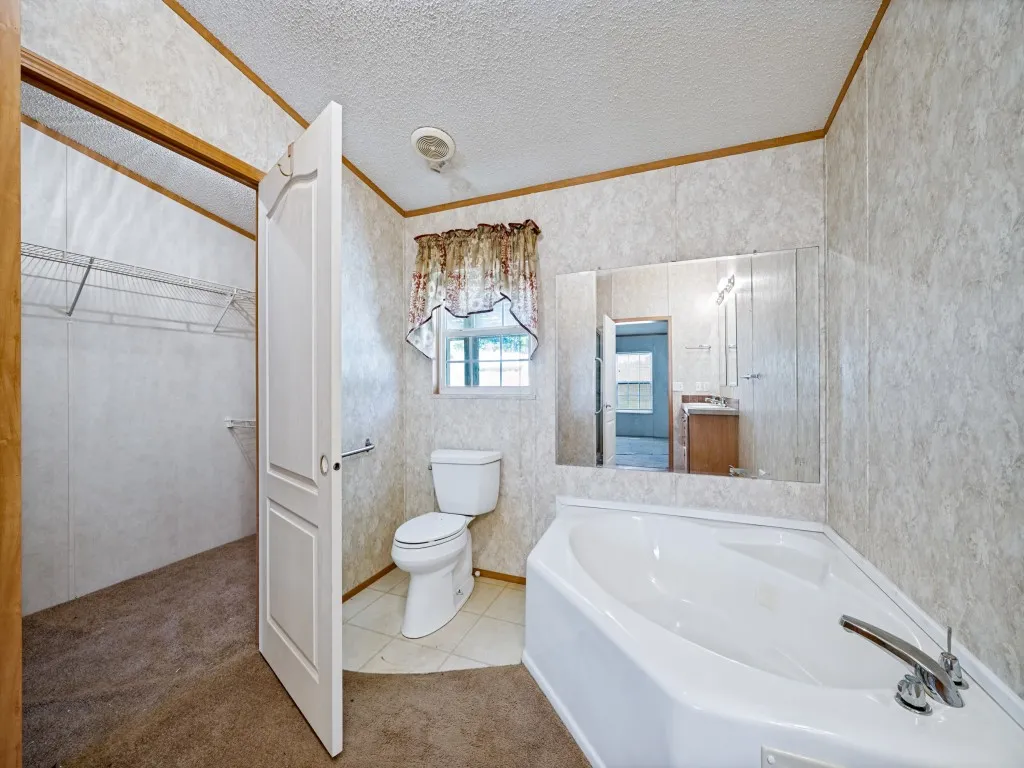 Bathroom featuring a garden tub