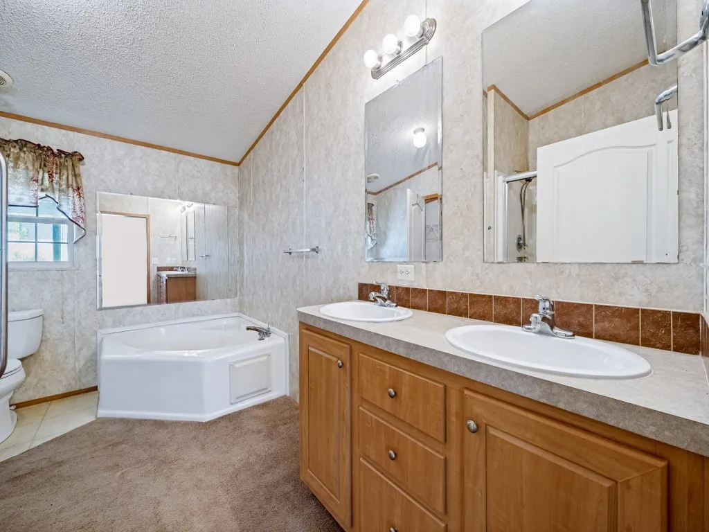 Bathroom featuring a dual vanity