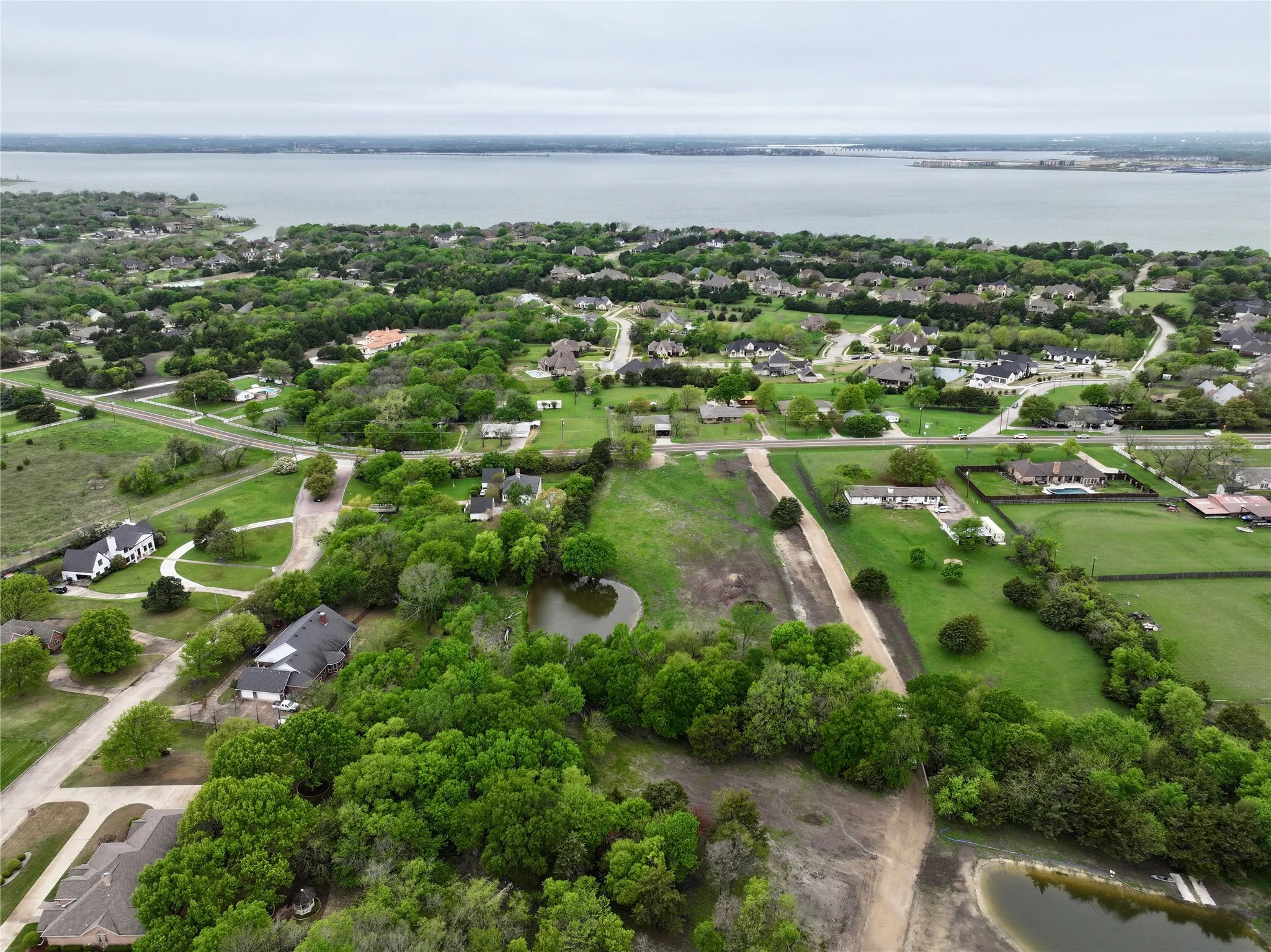 Aerial view of residential area featuring Lake Ray Hubbard.