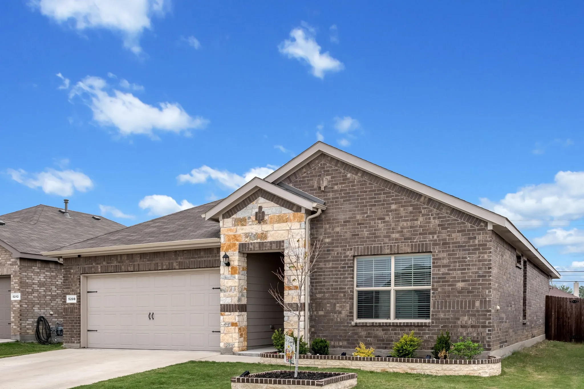 Brick exterior with stone facade accents