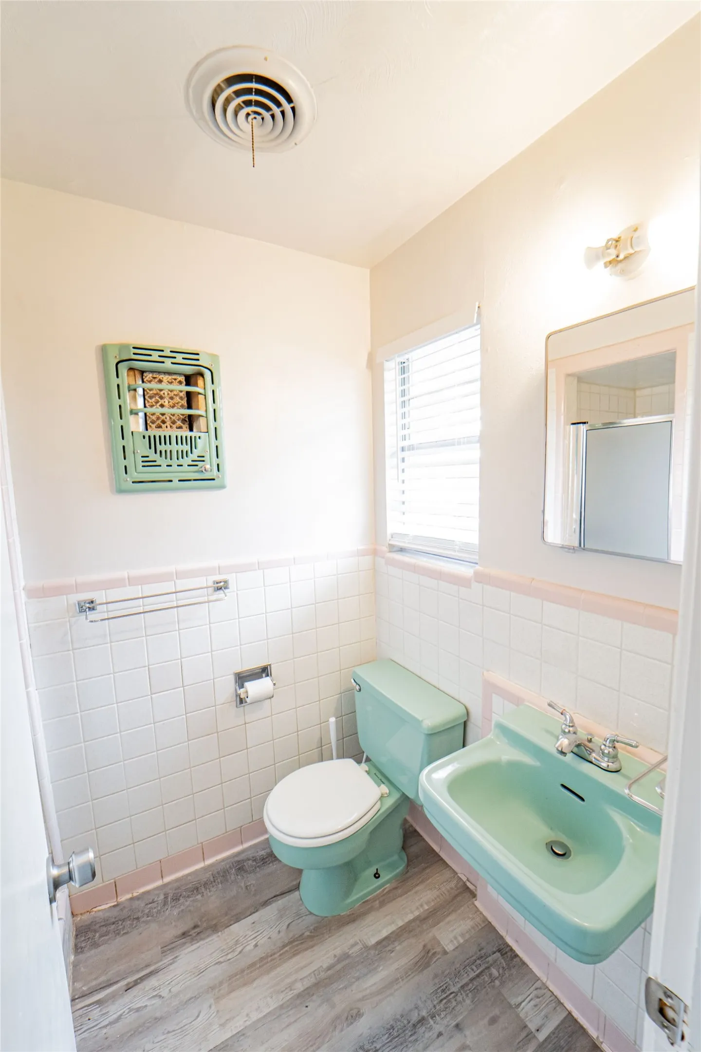 Primary Ensuite Bathroom-light and bright with walk-in shower.