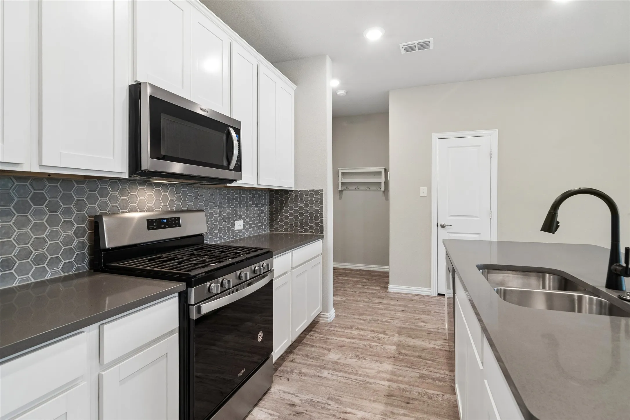 Mud room area at entry from garage