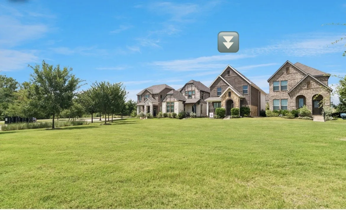 Front patio enjoys this view & extra yard