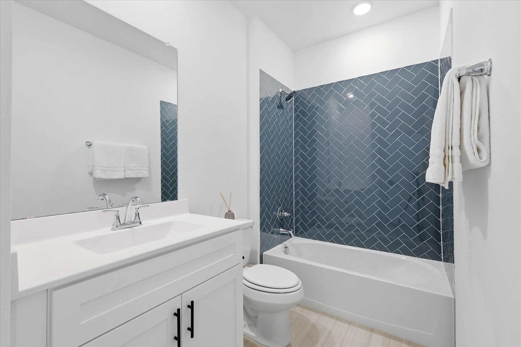 Bathroom that is across hall from additional bedroom on main floor.
