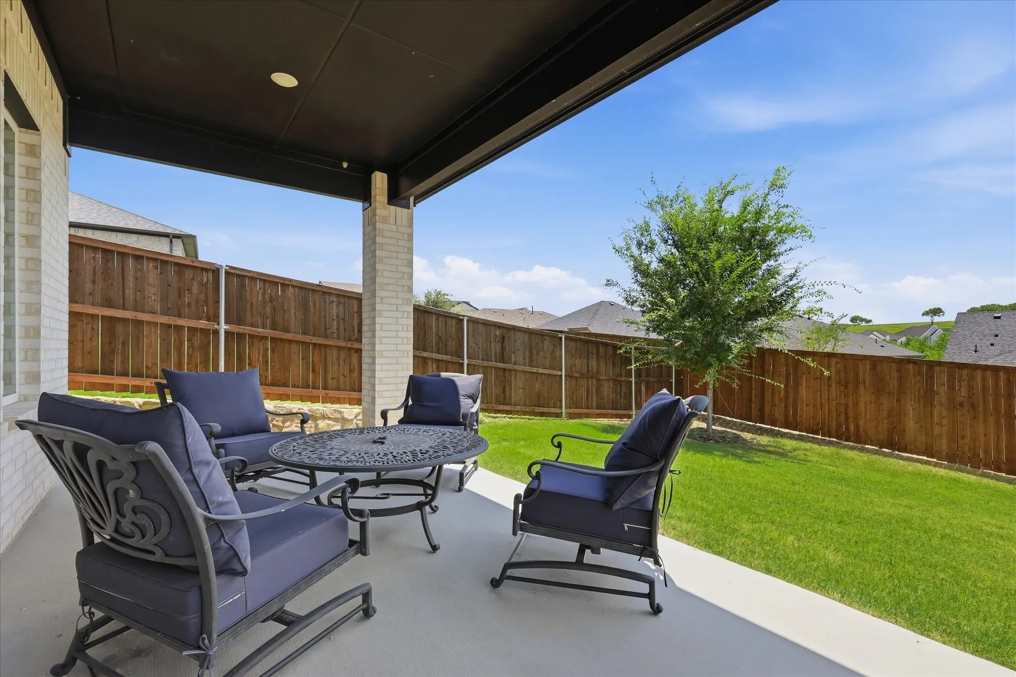 Extended covered patio, perfect for entertaining.