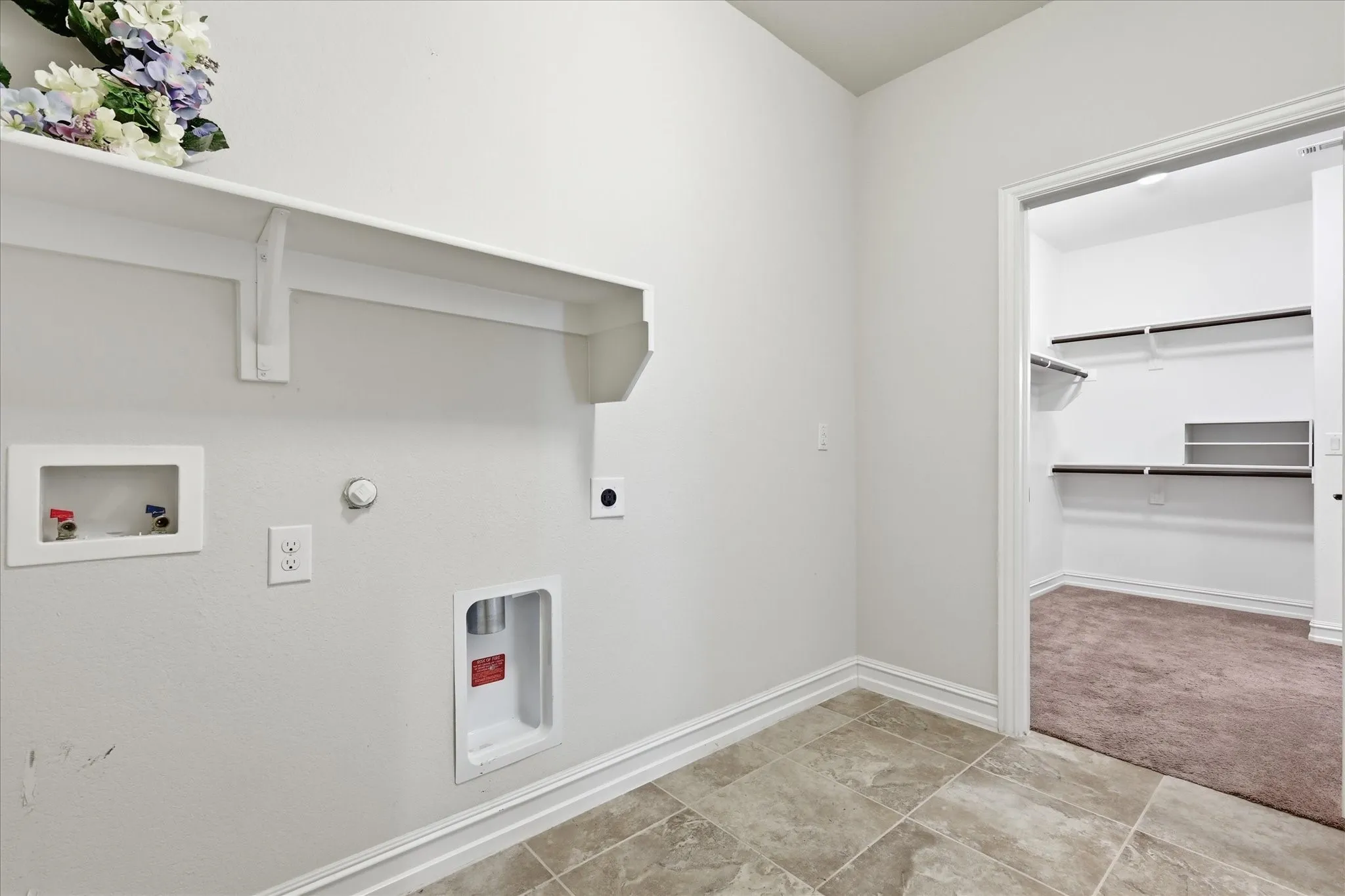 Utility Room Connected to Primary Walk In Closet