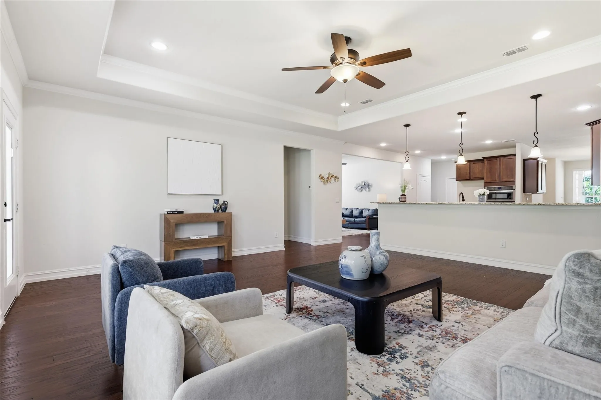 Living room opens to kitchen