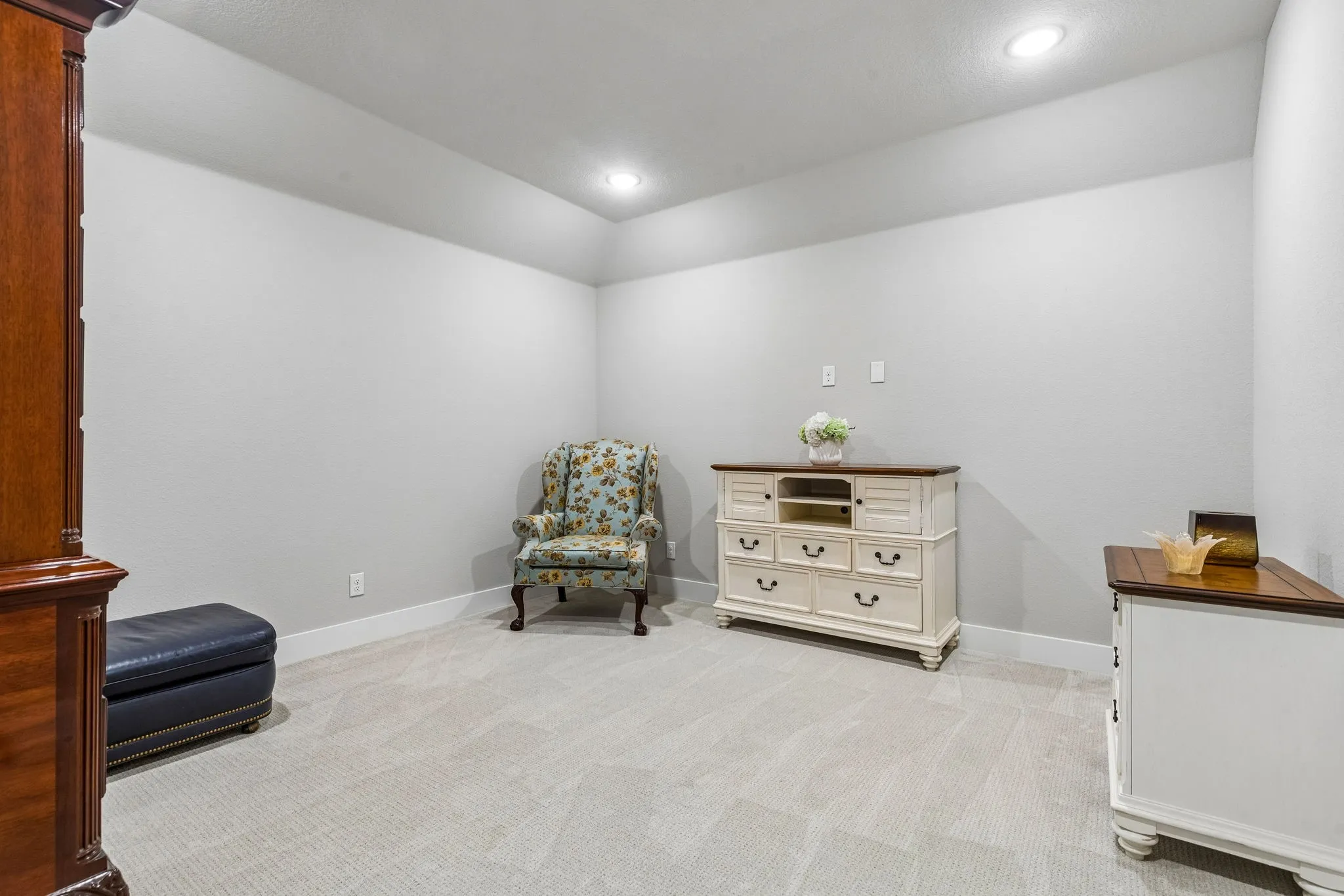 Double doors provide access to the second level media room.