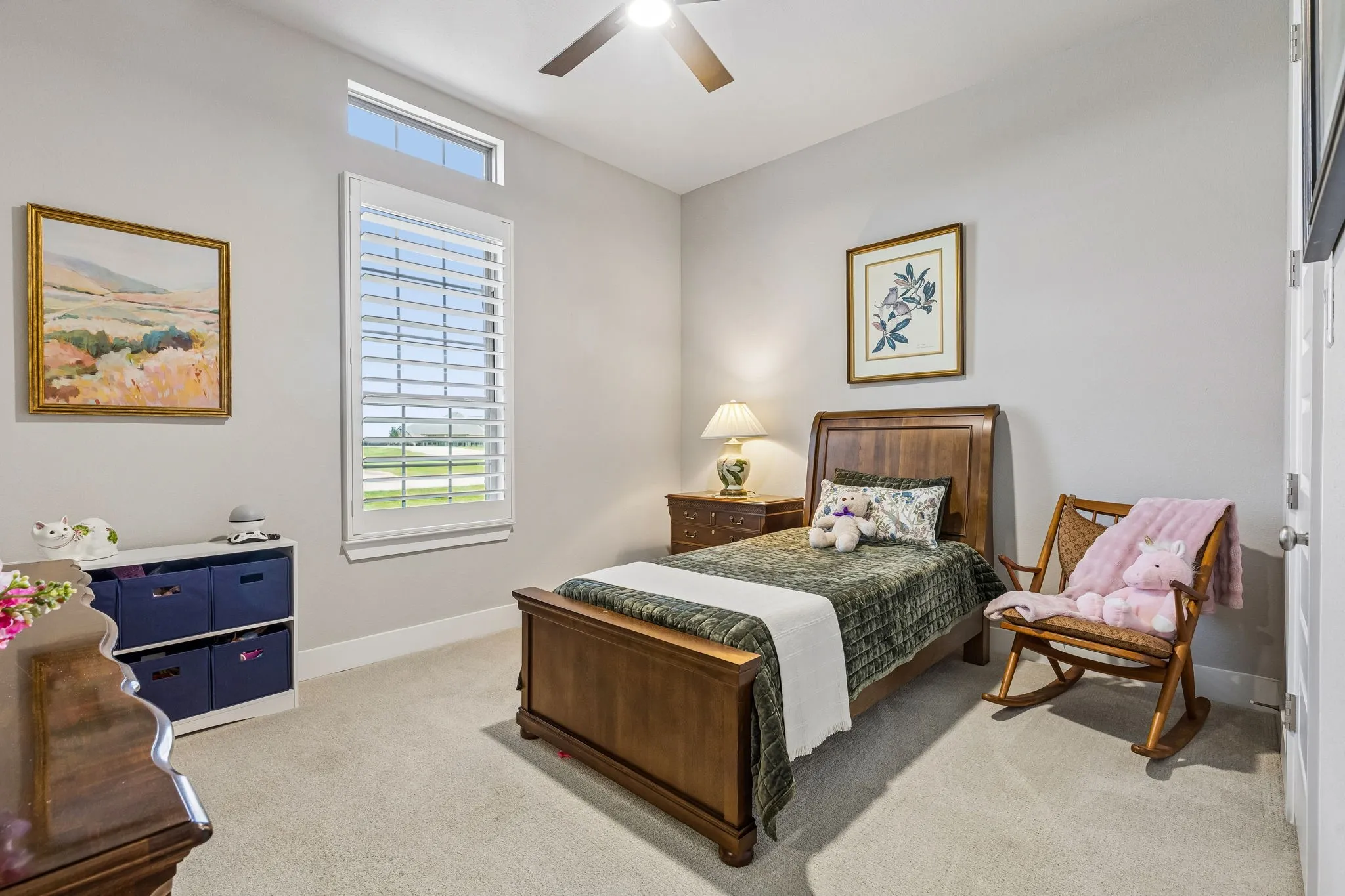 First floor guest suite with walk-in closet and easy access to a full bathroom with walk-in shower.