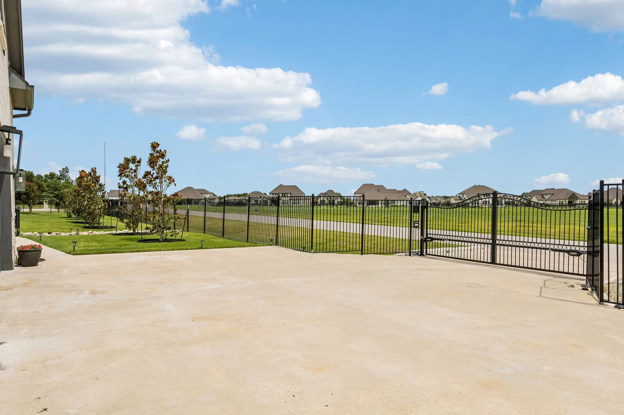 The fully fence in yard is secured by a new solar-powered electric gate.