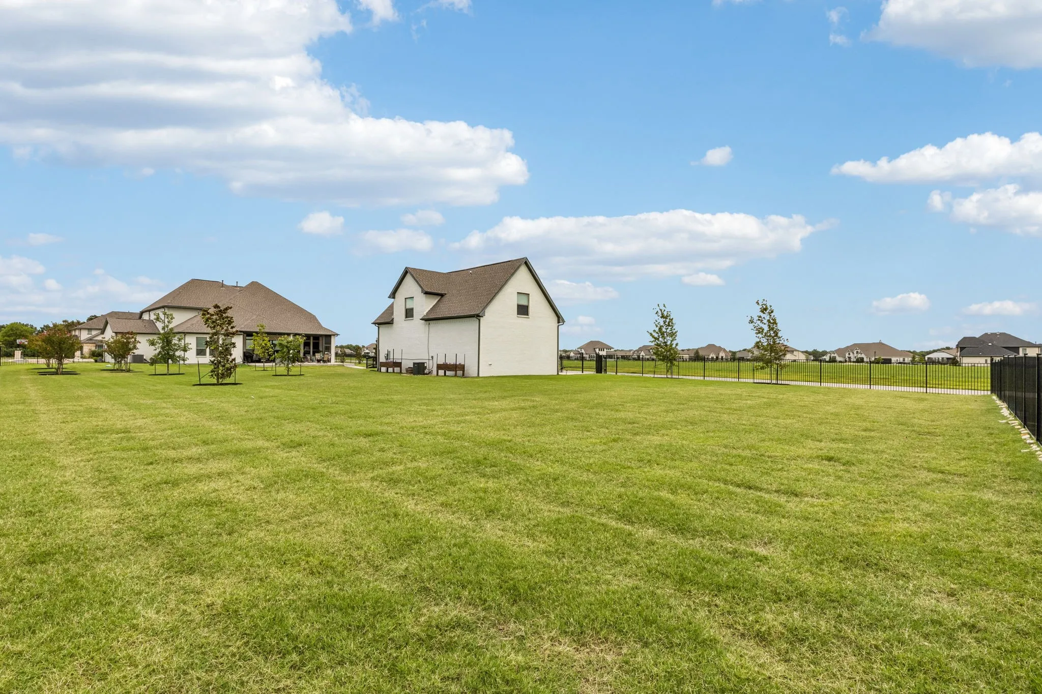 Situated on a premium one-acre corner lot adjacent to a protected multi-acre reserve, this beautifully designed custom home offers six garage spaces, a fully equipped private guest apartment, and exceptional versatility for entertaining, multigenerational living, or hobbyists seeking unmatched space.