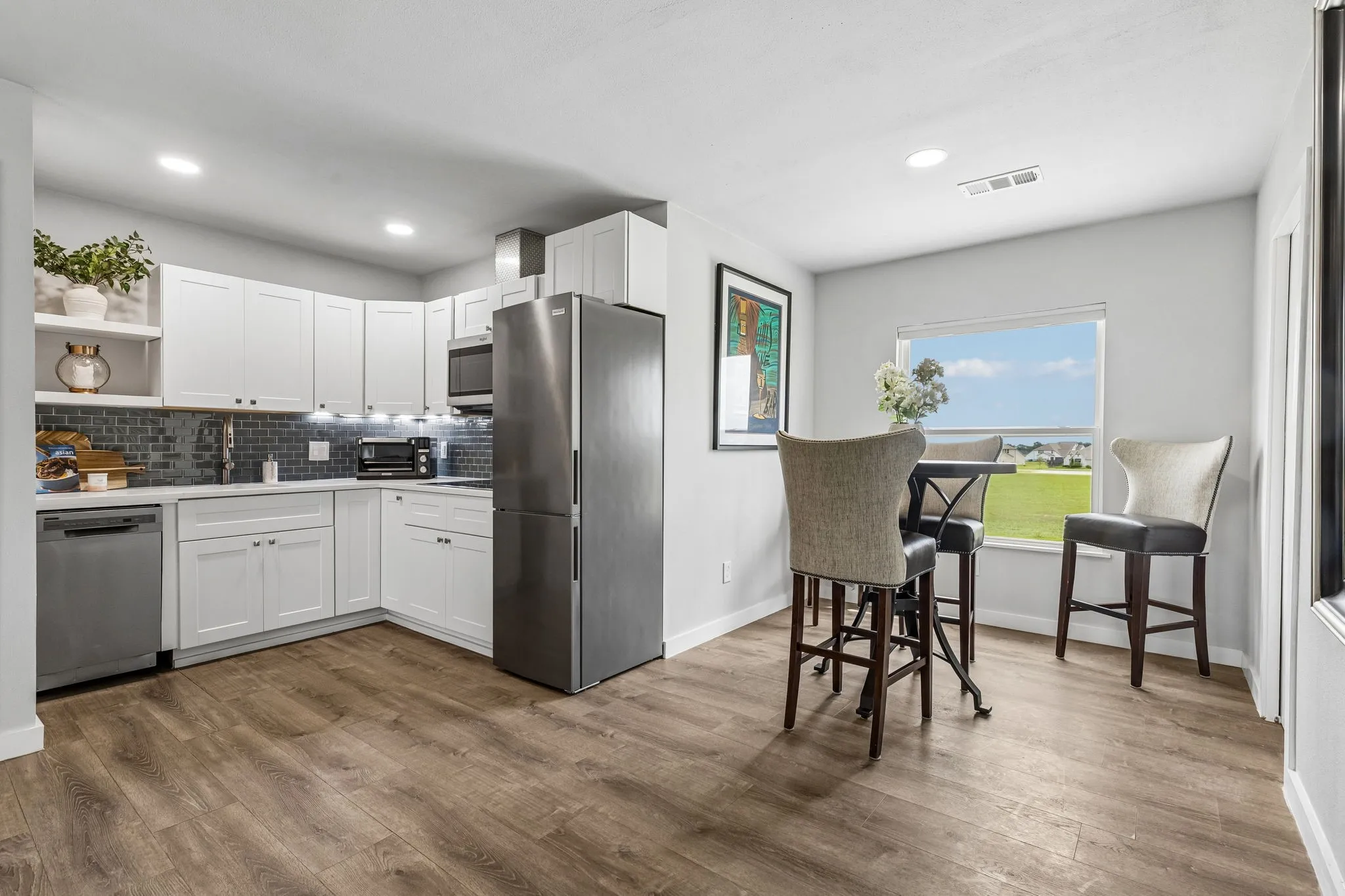 Beautifully finished apartment offers the comfort and privacy of a second residence with a full kitchen, dining area, living room, bedroom, full bath, separate HVAC system.