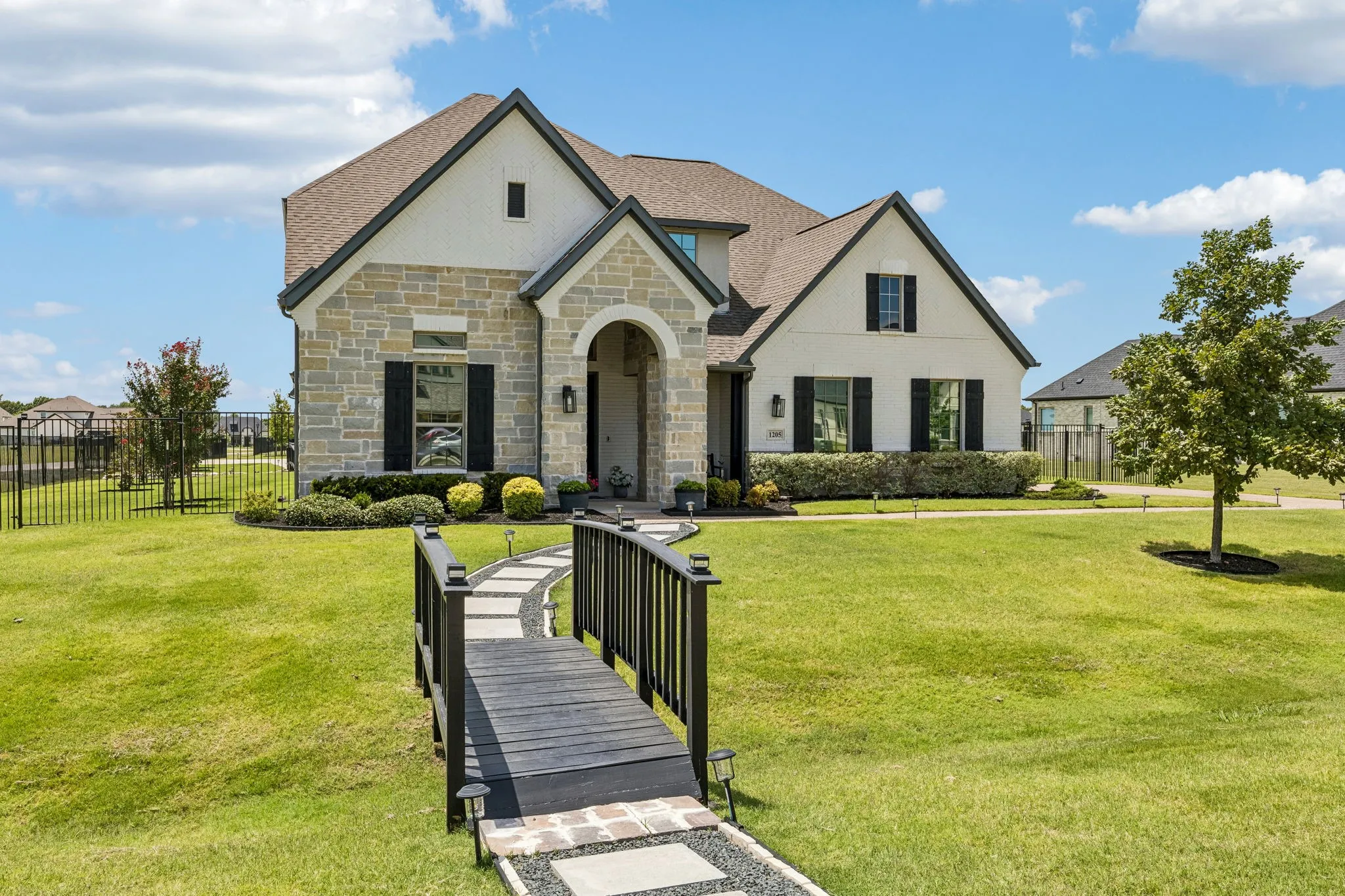 Situated on a premium one-acre corner lot adjacent to a protected multi-acre reserve, this beautifully designed custom home offers six garage spaces, a fully equipped private guest apartment, and exceptional versatility for entertaining, multigenerational living, or hobbyists seeking unmatched space.