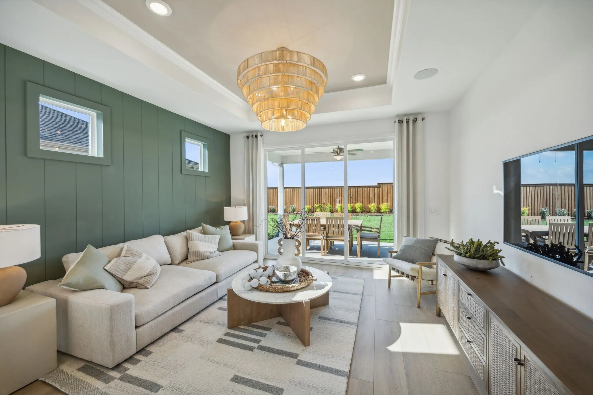 *Model Representation - Spacious gathering room with large windows