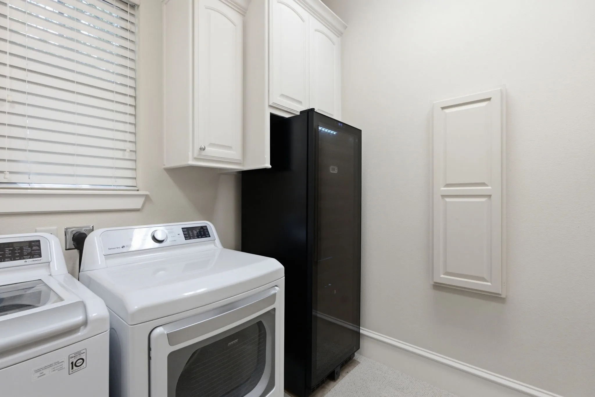 Washer and dryer remains, wine refrigerator remains