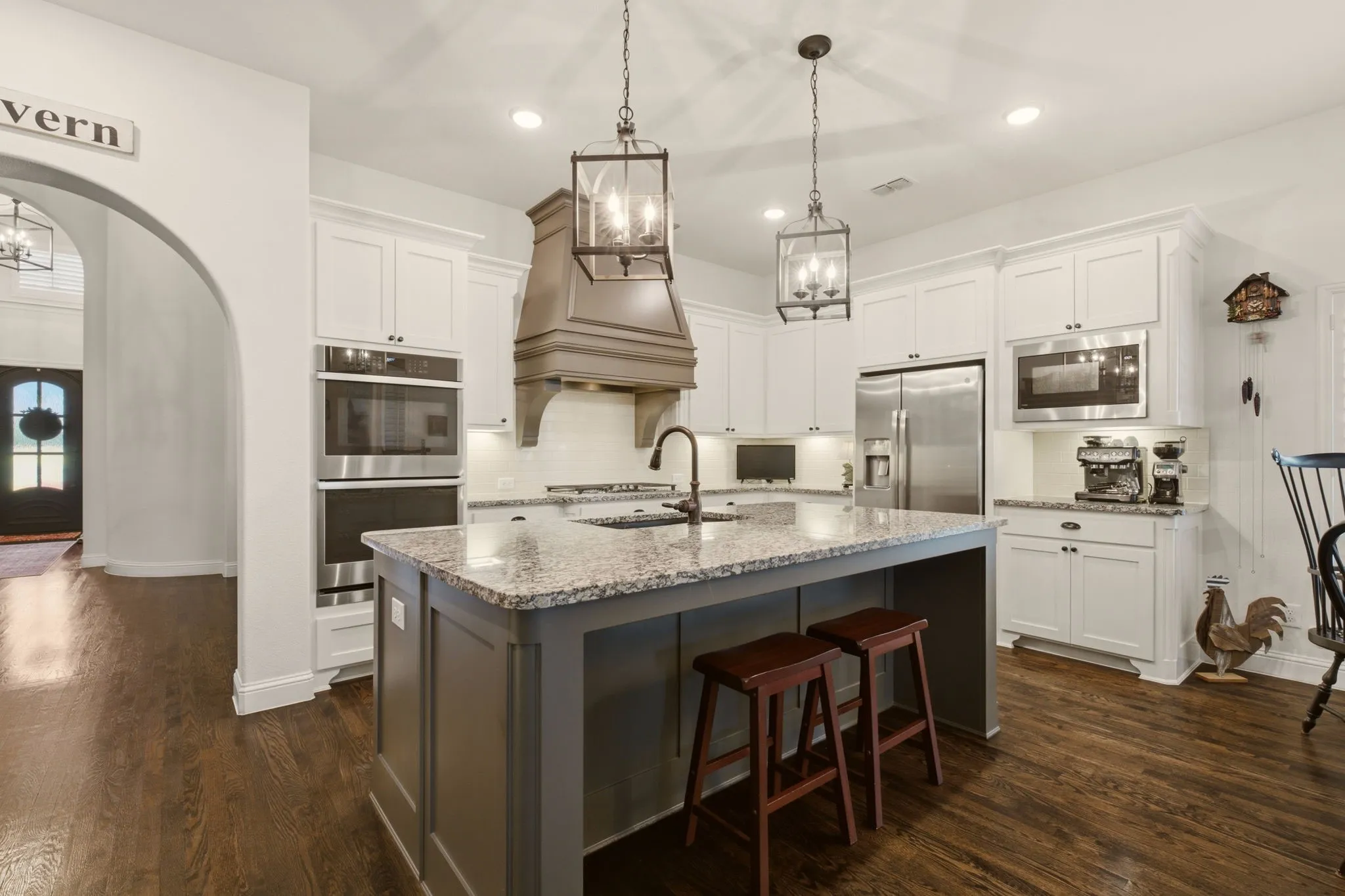 Cozy up to the breakfast bar while the family chef is preparing a sumptuous meal! Love the large island for meal prep or displaying food for entertaining.