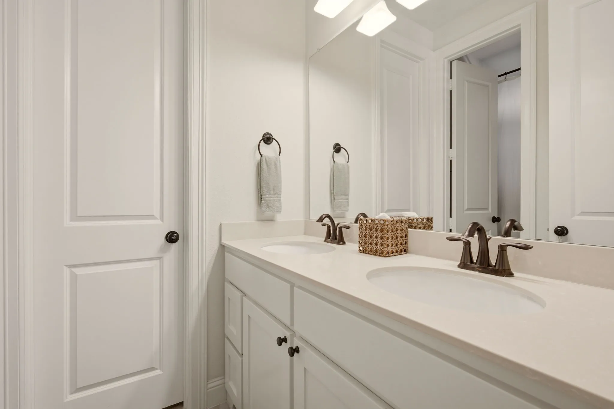 Full bath 2 is shared by bedrooms 2 & 3. Shower/tub combo through the left door.