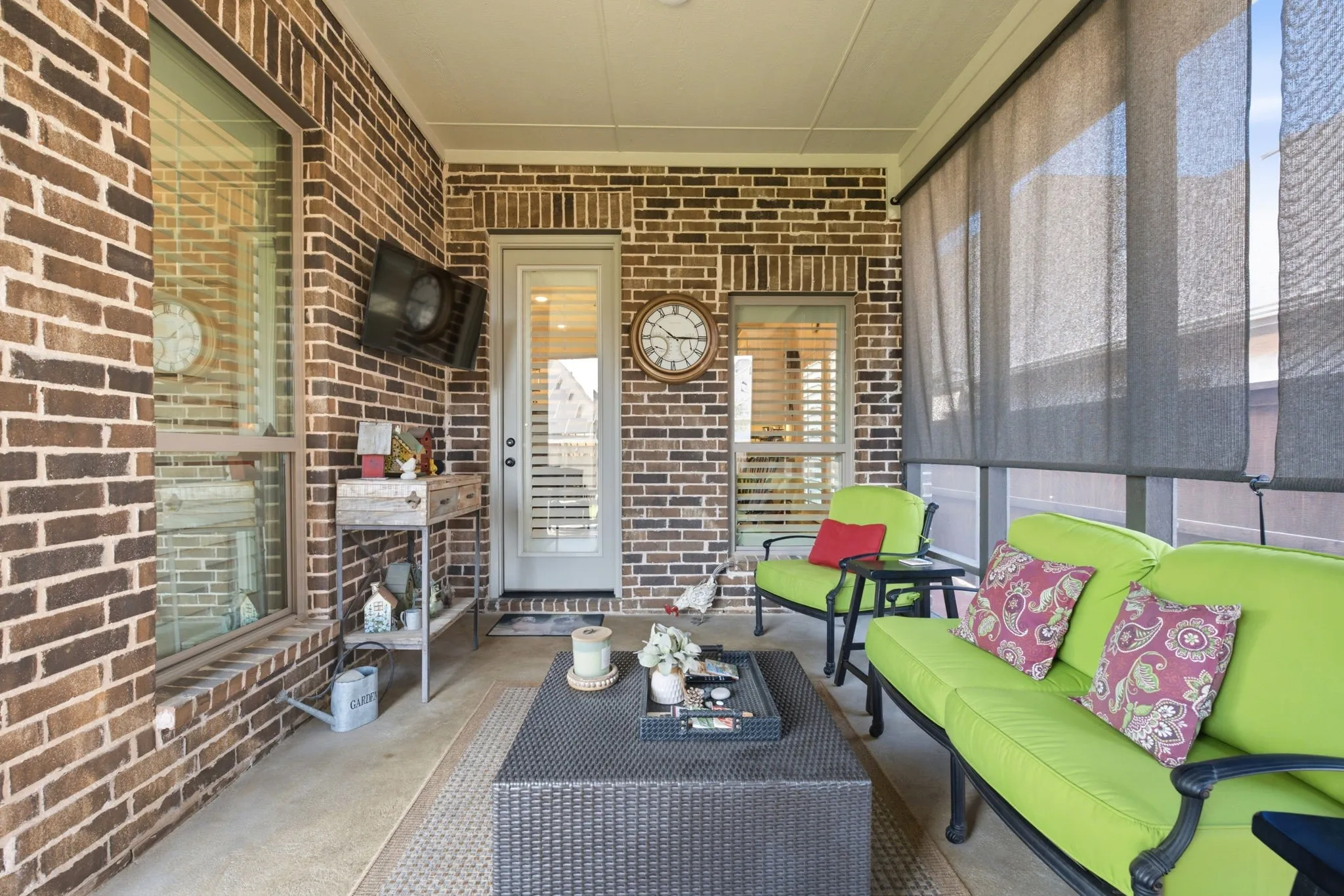 Thoughtfully added by the seller, the screened-in patio offers a refined outdoor living experience designed for both relaxation & entertaining. Note the stained concrete floors & pull down shades for privacy & warmth.