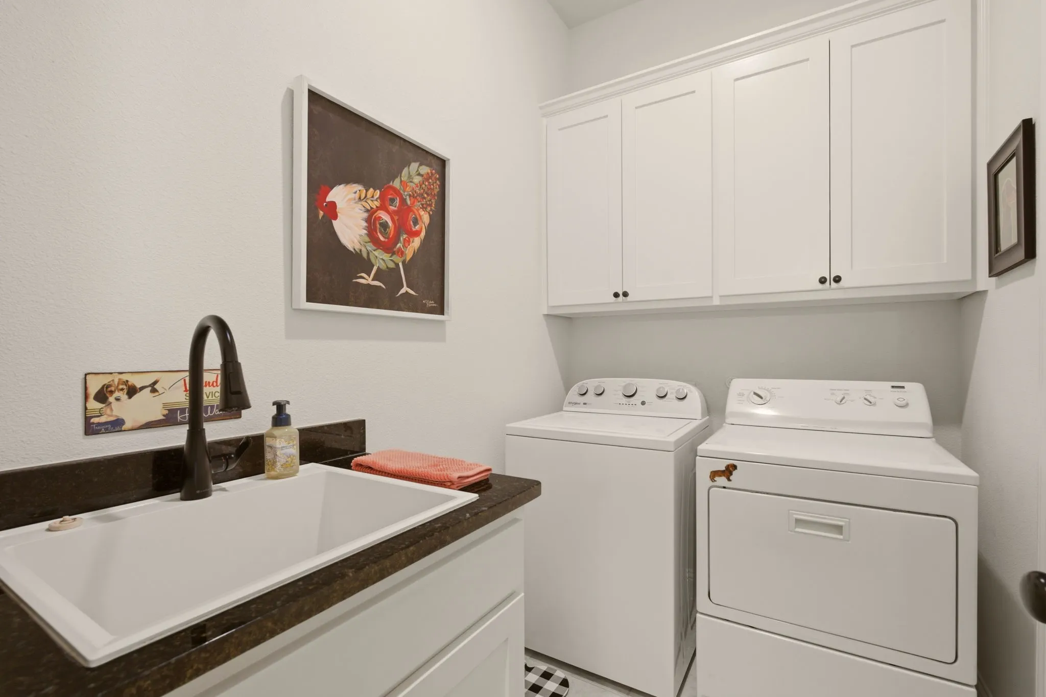 For those who appreciate a spacious, functional laundry room...this is it! Just bring your own washer & dryer.