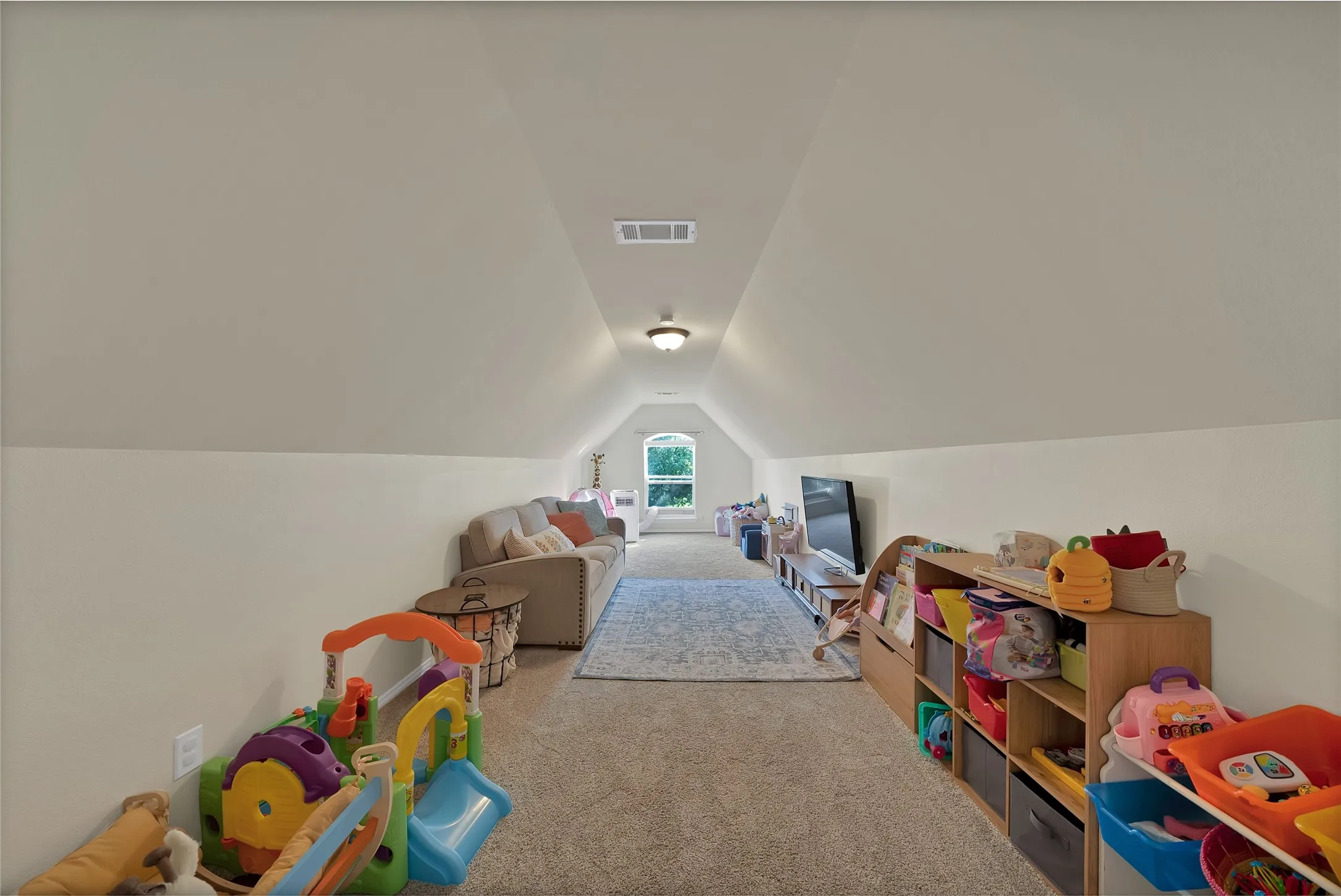 Carpeted bonus room featuring vaulted ceilings, recessed lighting, and a window dormer